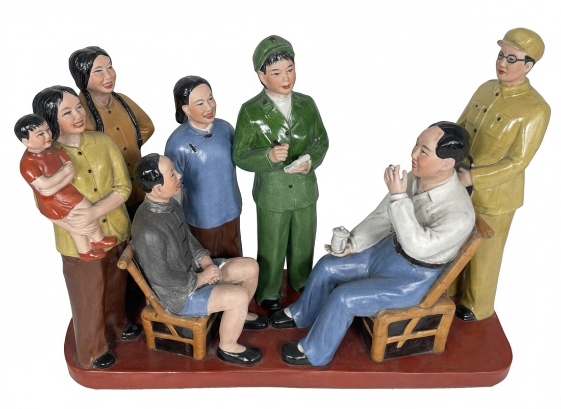 A Chinese Painted Pottery Figural Group of Chairman Mao and Revolutionary Public, 1960/70: 13 in. high, 18 in. wide.