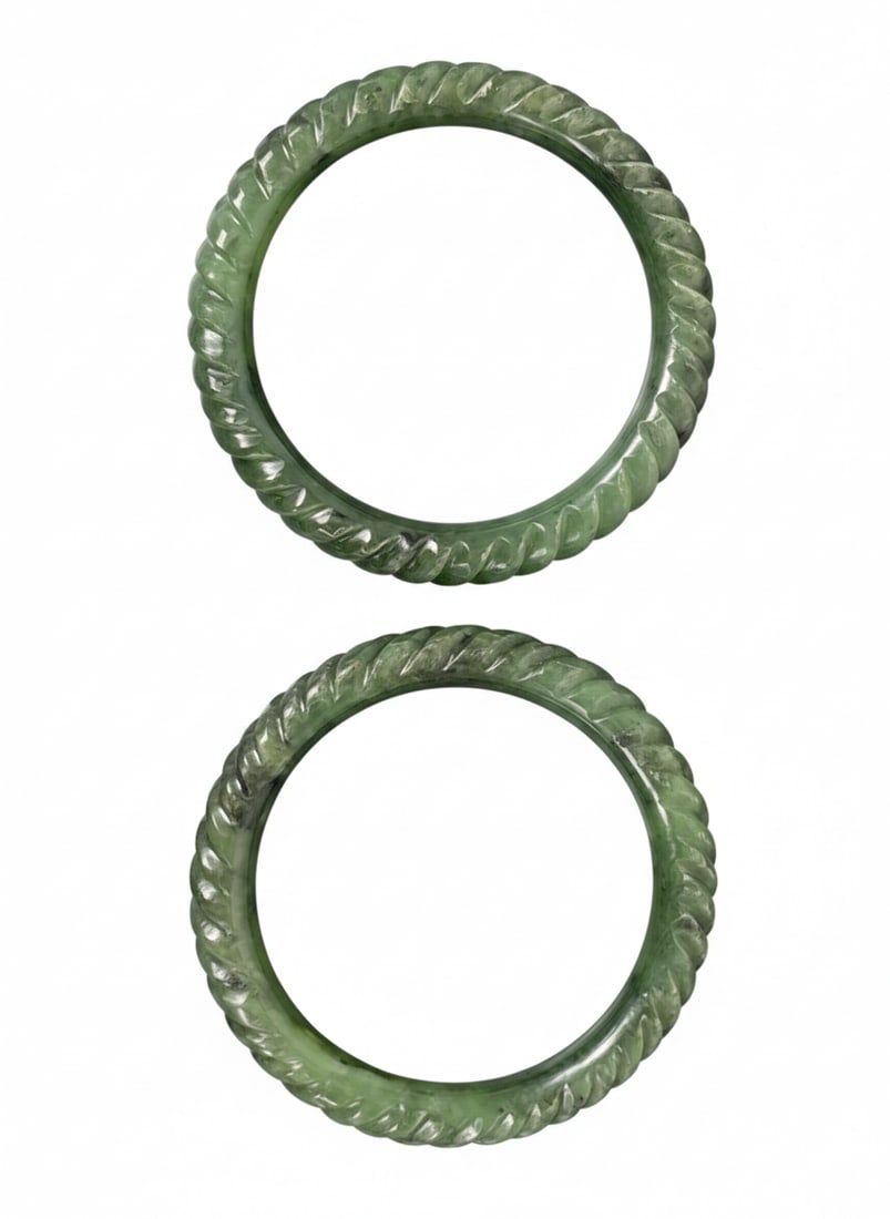 A Pair of Chinese Carved Jadeite Bangles (1 of 9)