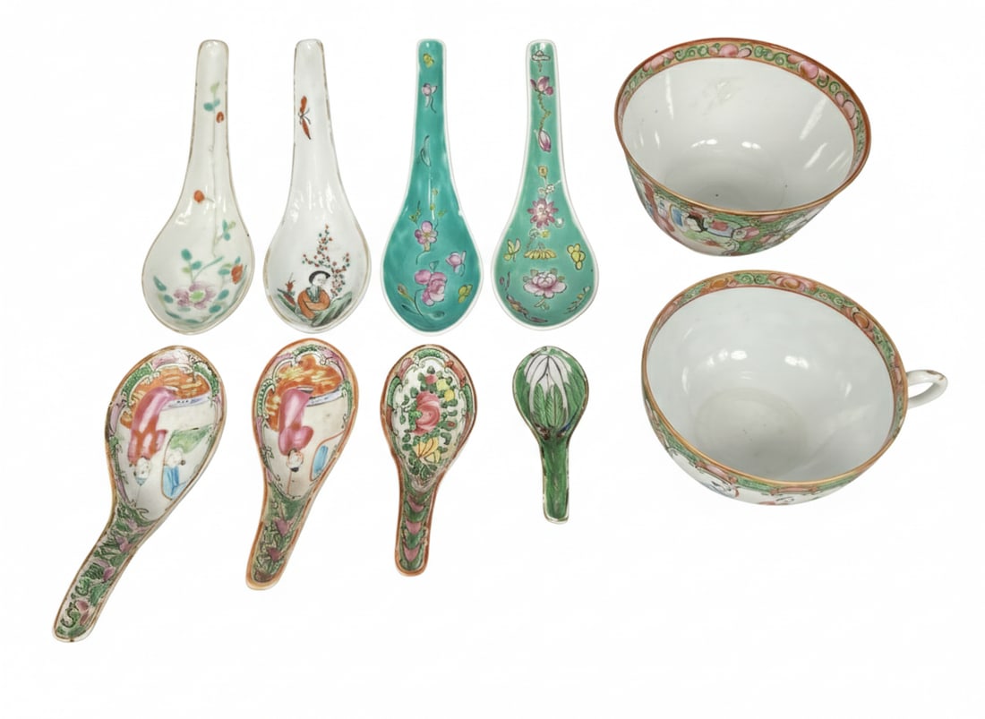A Group of Ten Chinese Famille Rose Porcelain Objects: Comprising a famille rose bowl, 2.3/8 in. high, 4.1/8 in. diam.; a famille rose tea cup, 2 in. high, 4.1/2 in. wide; and eight spoons, the longest measures 5.3/4 in. long, 1.3/4 in. wide.