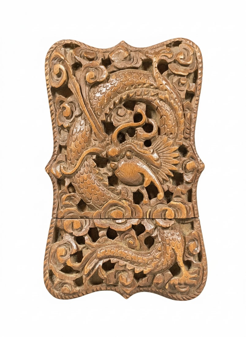 A Carved Wood 'Dragon' Business Card Holder: 3.3/4 in. long, 2.3/8 in. wide.