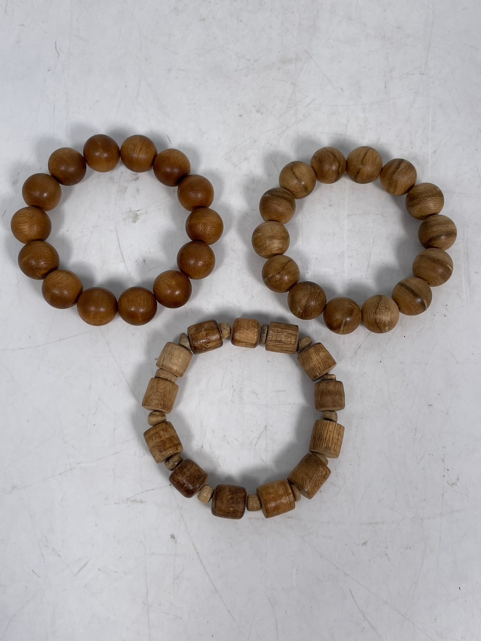 A Group of Three Strings of Agarwood Beads, Shouchuan: All with plastic containers.