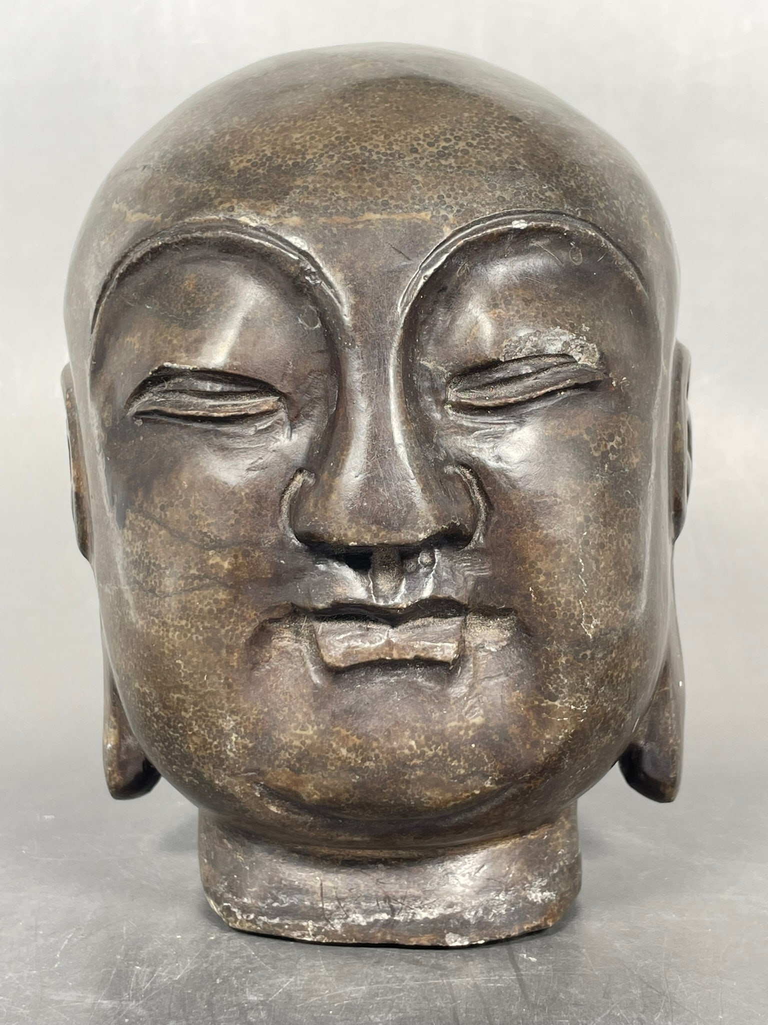 A Stone Carving of Buddha Head (1 of 8)