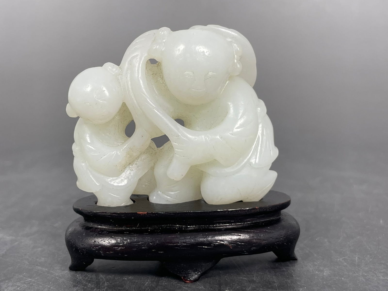 A Chinese Carved White Jade Figural Group of Two Boys (1 of 8)