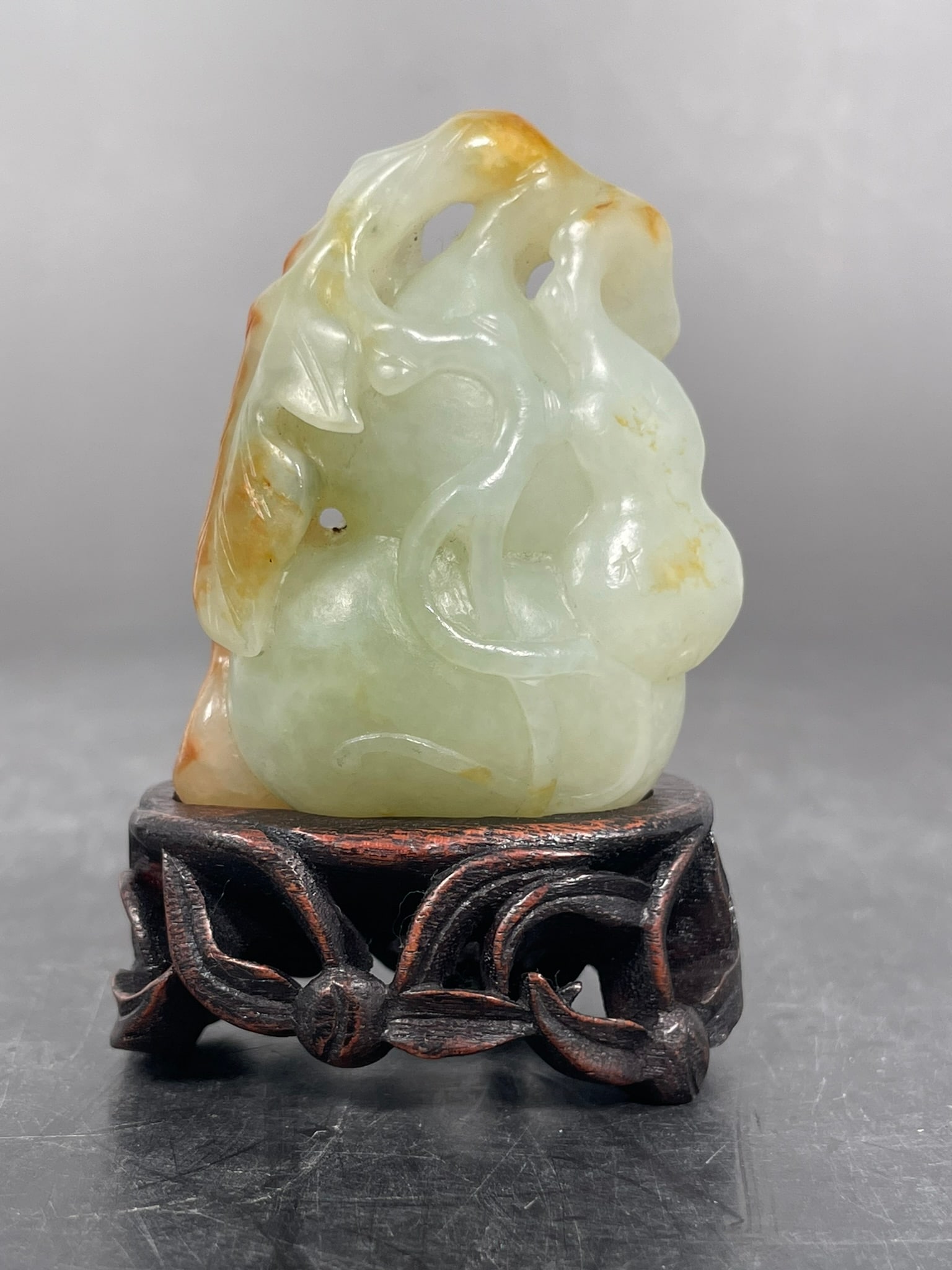 A Chinese White and Russet Jade Carving of Gourd (1 of 7)