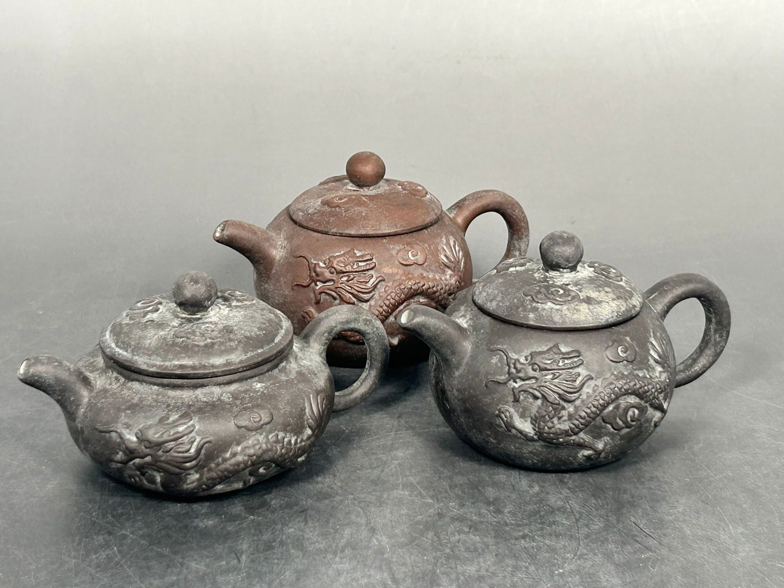 A Group of Three Chinese Yixing Pottery Teapots and Covers (1 of 14)