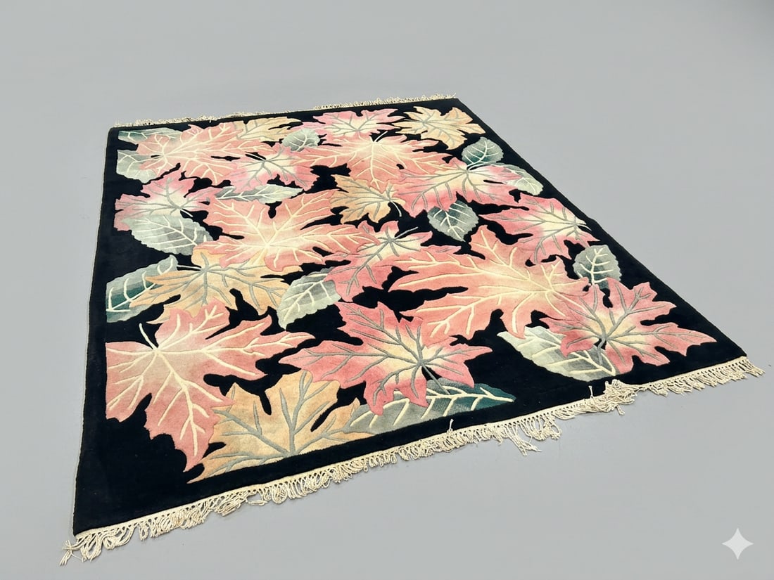 A Chinese Wool Rug with Maple Leaves Pattern: 110 in. x 90 in.