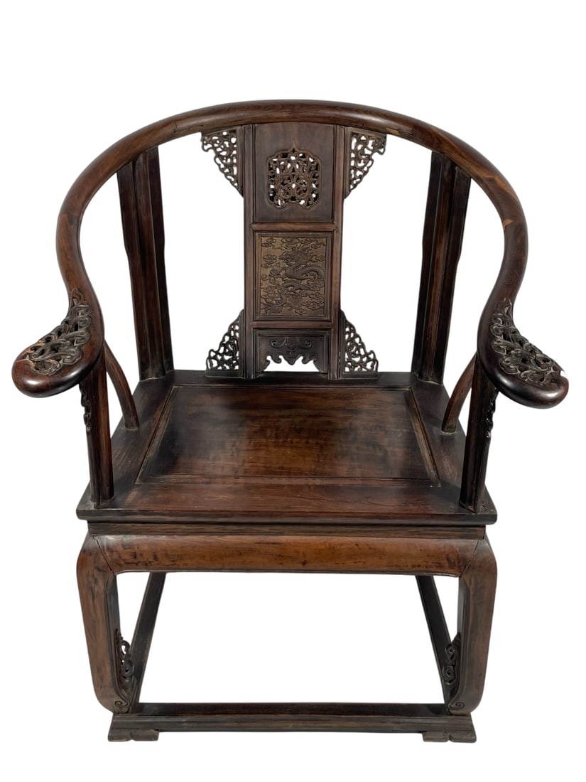 A Pair of Chinese Hongmu Armchairs: 39 in. high, 28 in. wide, 27 in. deep each.