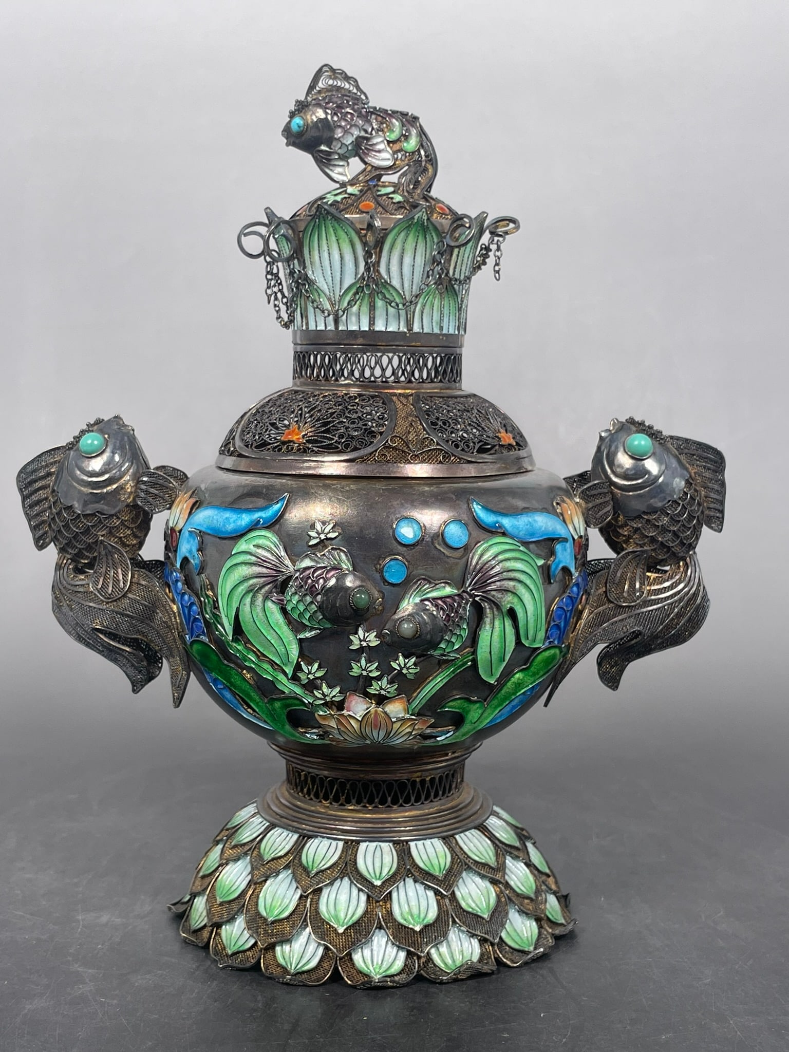 A Chinese Silver Gilt Enamel Filigree Censer and Cover: 8 in. high, 6.1/2 in. wide.