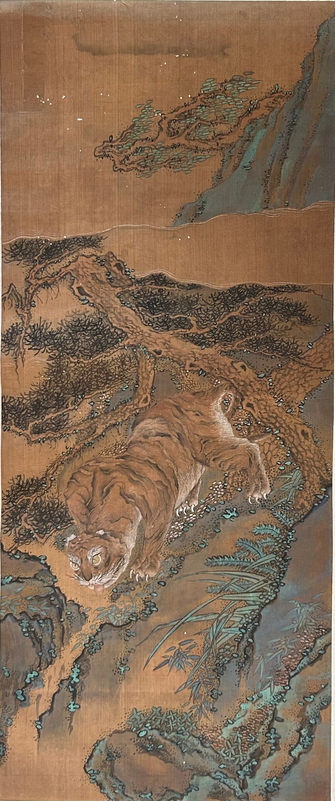 A Chinese Painting of Tiger: Color on silk, mounted as hanging scroll, 31.1/2 in. x 13 in. for the painting, 67.1/2 in. x 17 in. overall.