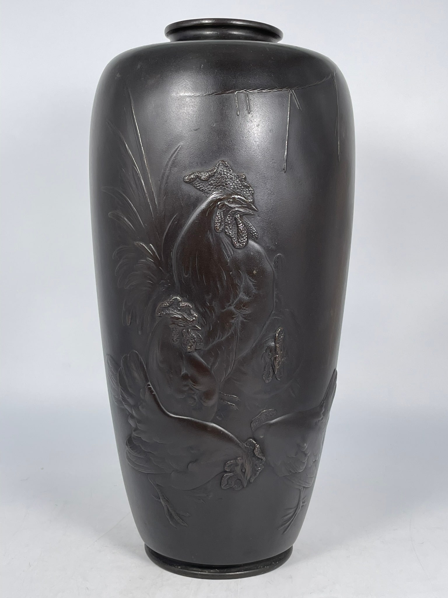 A Japanese Bronze 'Roosters' Vase: 18 in. high, 8.1/2 in. wide.