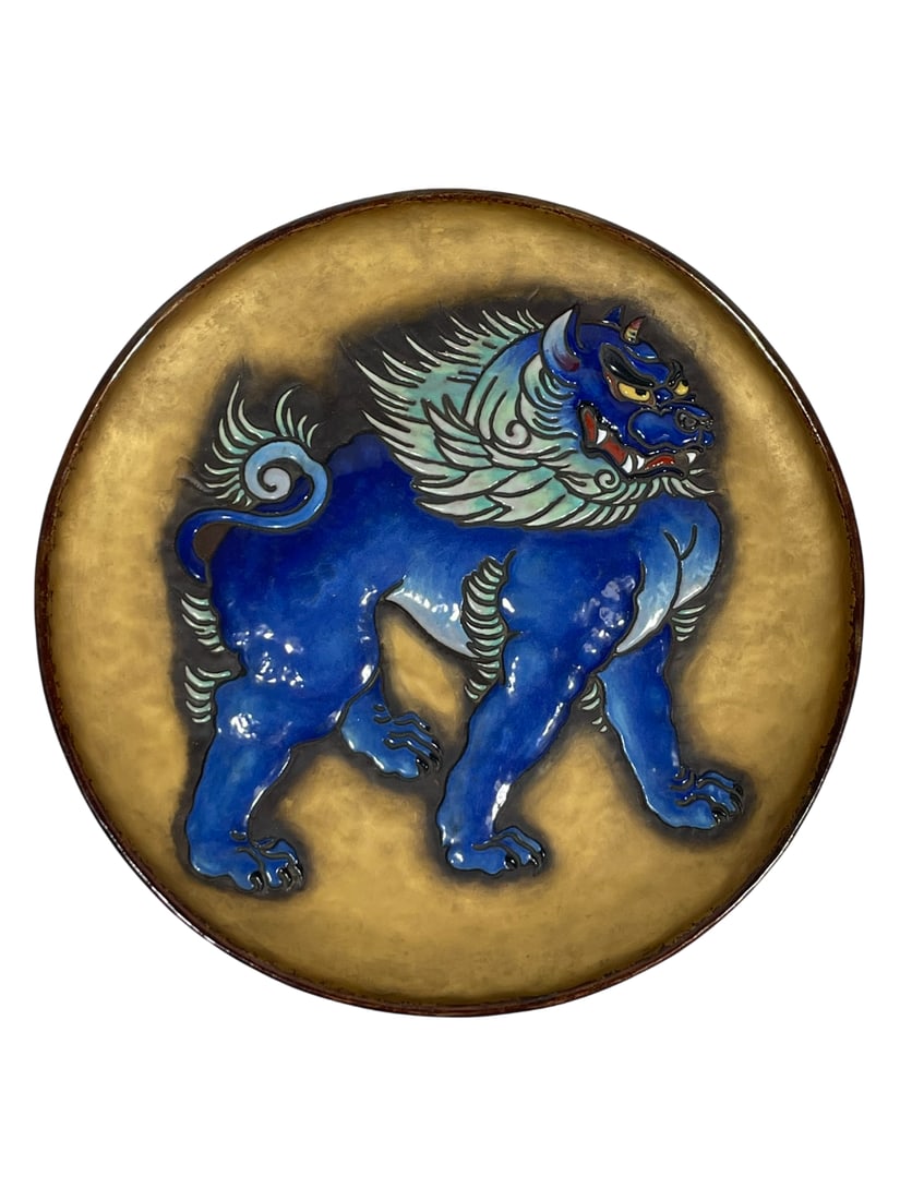 A Japanese Cloisonne Enamel 'Buddhist Lion' Charger: Kanji inscriptions on the Japanese wood box cover. 15.1/2 in. diam. for the charger.