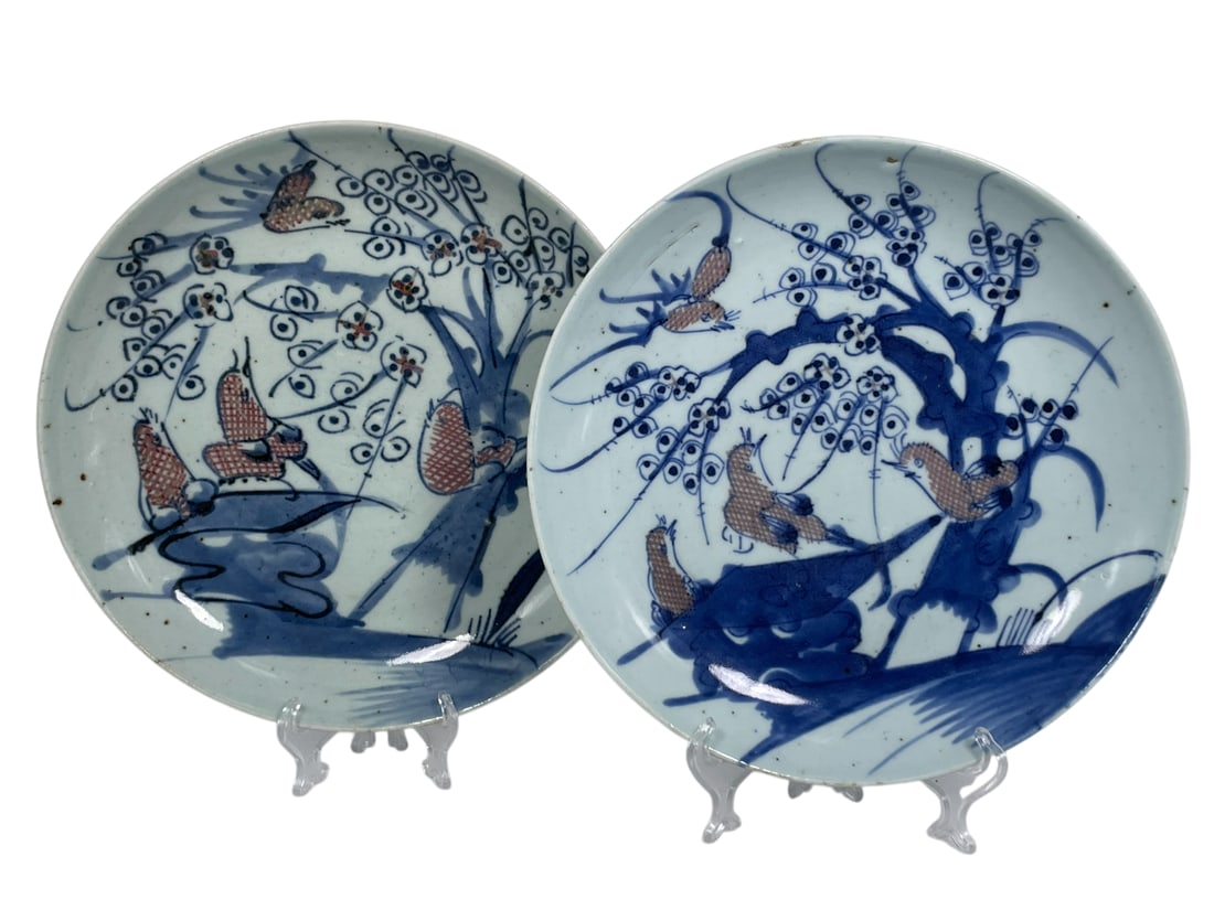 Two Chinese Blue and White 'Bird and Flower' Dishes: 10.1/4 in. diam. each.