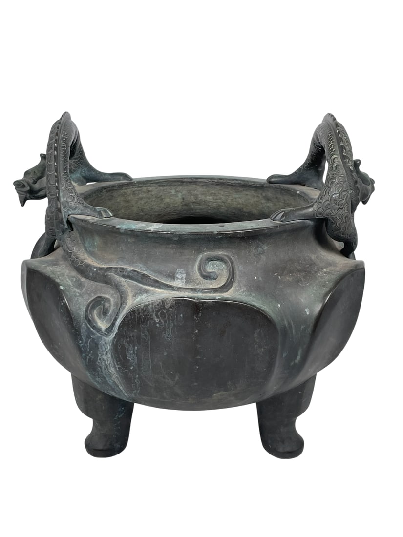 A Vintage Chinese Bronze Tripod Censer: 10 in. high, 10 in. wide.
