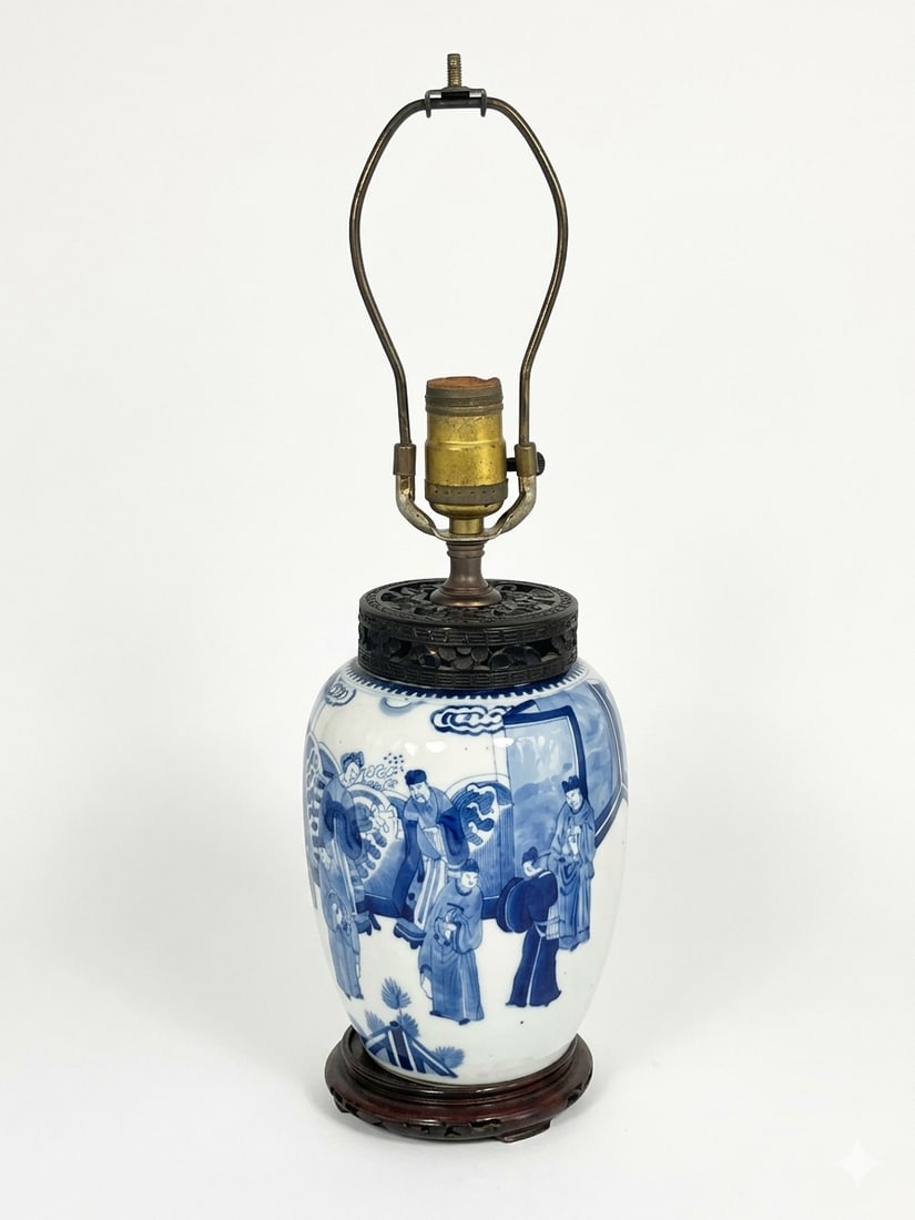A Chinese Blue and White 'Figural' Jar: Mounted as a lamp, the jar measures 6.3/4 in. high, 5.1/2 in. wide; 17.1/4 in. high, 5.1/2 in. wide overall.