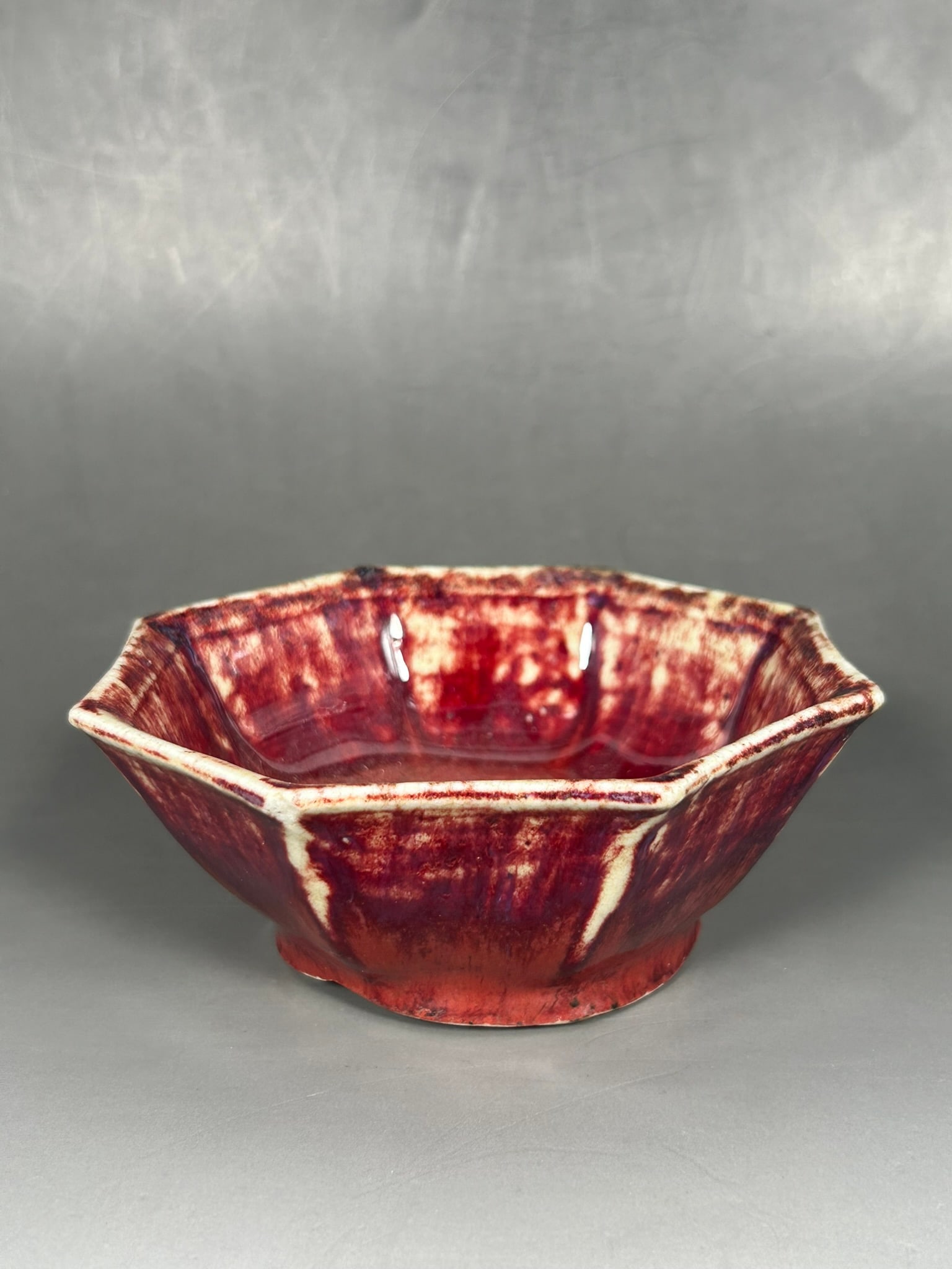 A Chinese Red-Glazed Octagonal Porcelain Bowl: 1.7/8 in. high, 5.1/8 in. wide.