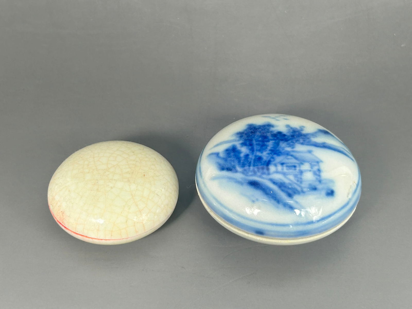 Two Chinese Porcelain Seal Paste Boxes and Covers: The blue and white one measures 1.1/4 in. high, 2.7/8 in. diam.; the crackle-glazed one measures 1.1/8 in. high, 2.1/4 in. diam.
