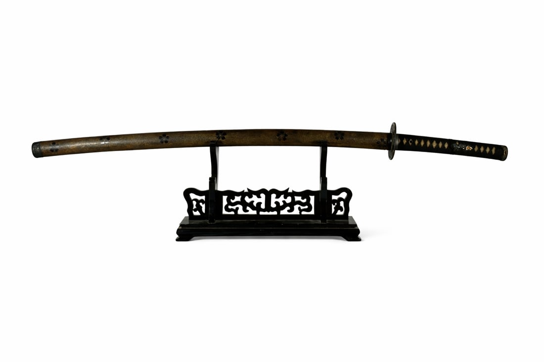 A Japanese Samurai Sword Katana, Fujiwara Kunimasa Mark: Fujiwara Kunimasa mark to one side of the tang, 27 in. long for the cutting edge, 39 in. long overall. With a cloth wrap. Stand not included.
