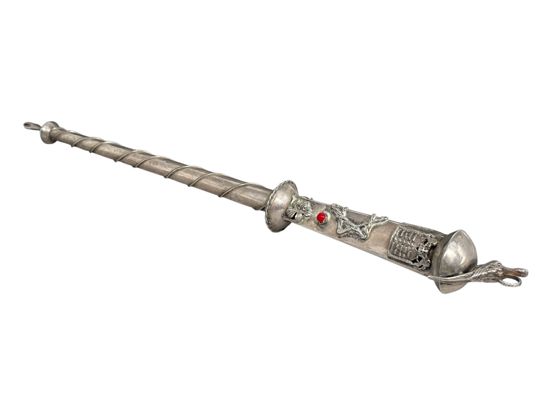 A Russian Silver Torah Pointer (Yad), B.C 1873 84 Marks: B.C 1873 84 Marks to the upper section. 13.1/4 in. long.
