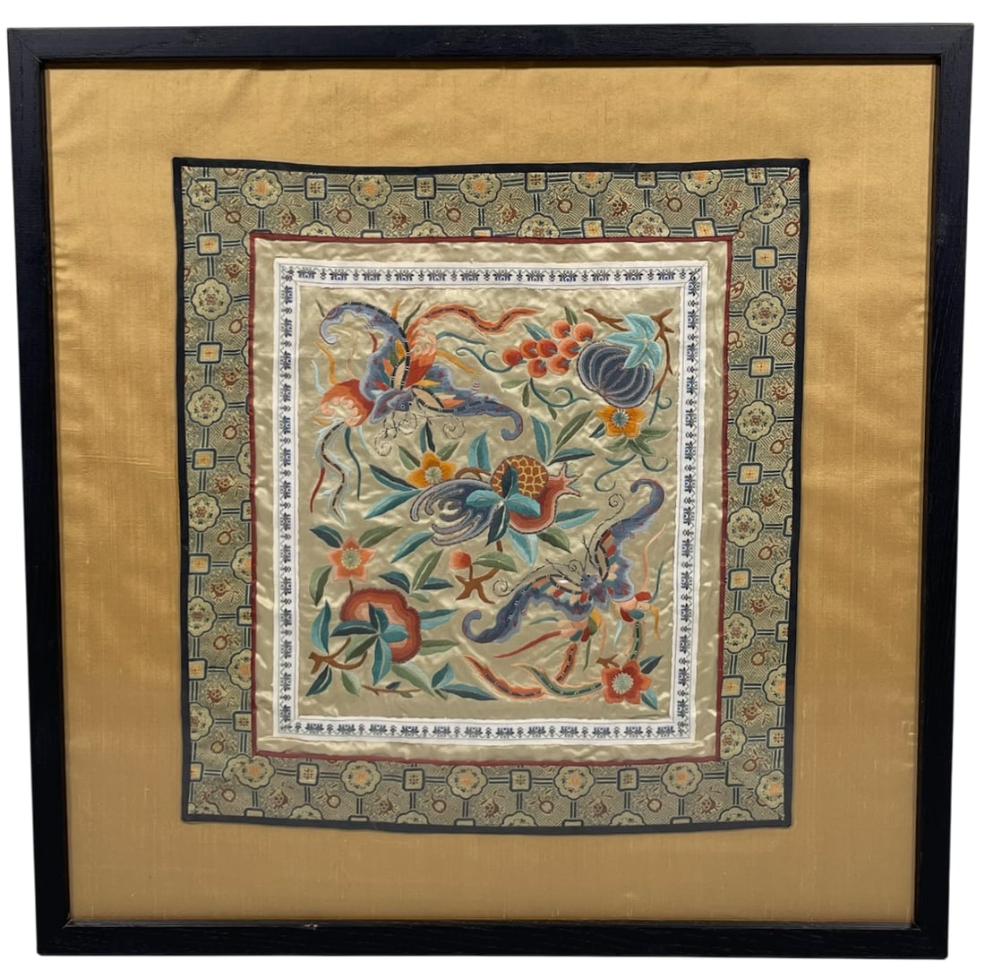 A Chinese Embroidered Silk 'Butterfly and Melon' Panel: 15.1/4 in. x 14.1/4 in. for the panel, 21.1/4 in. square overall including the frame.