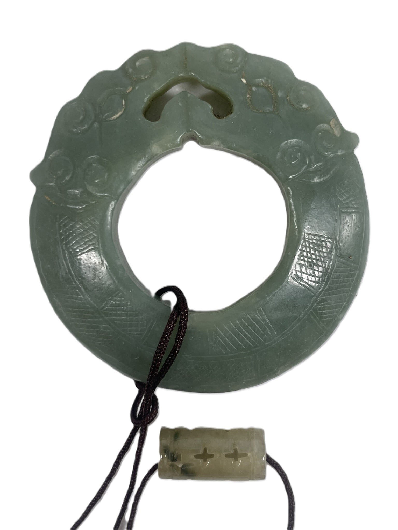 A Chinese Carved Celadon Jade Ring, Huan (1 of 12)