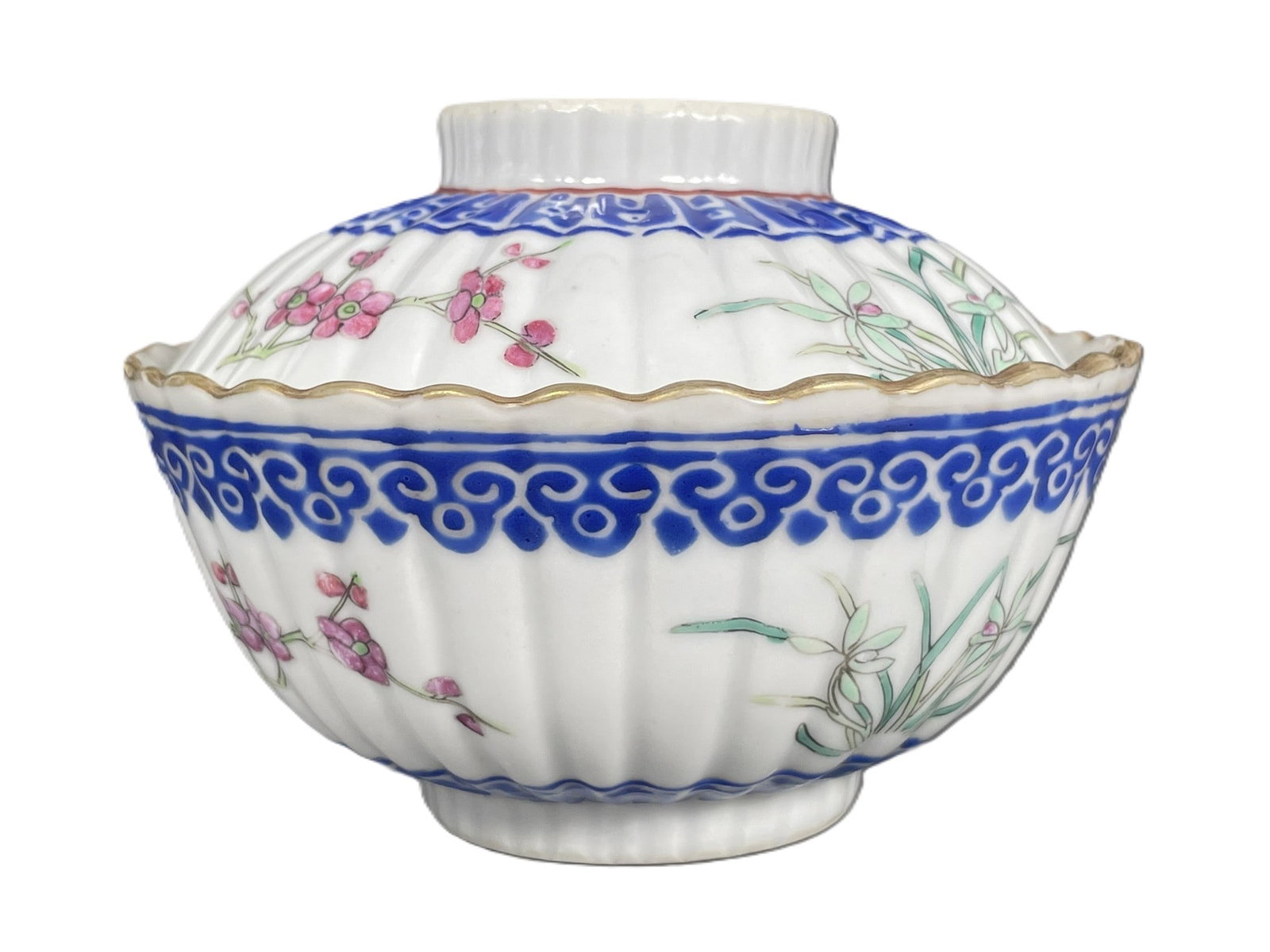 A Set of Chinese Famille Rose 'Plum Blossom and Orchids' Tea Cup, Cover, and Stand (1 of 18)