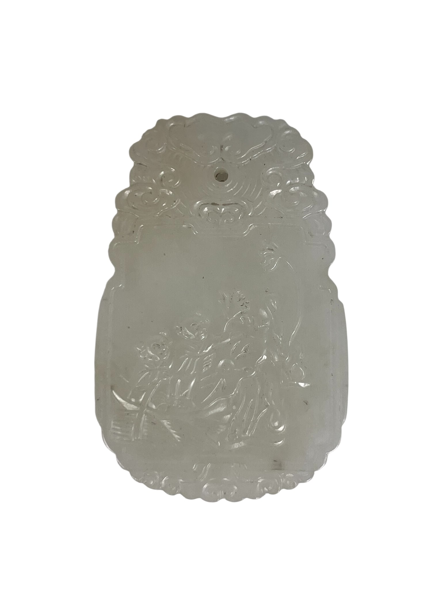 A Chinese Carved White Jade 'Lotus' Plaque: 2.1/8 in. high, 1.3/8 in. wide.