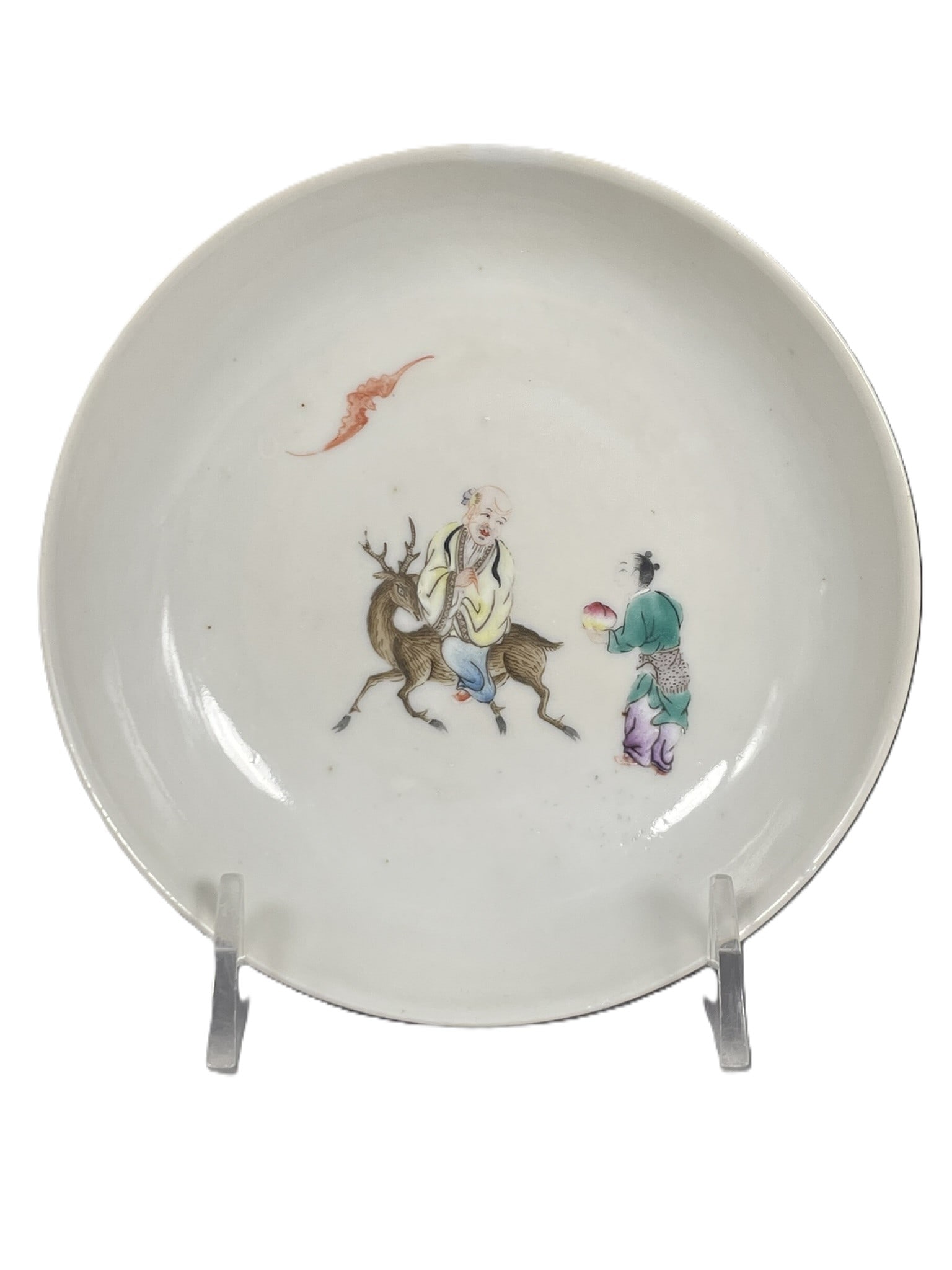 A Chinese Small Famille Rose Ruby-Back 'Shoulao and Attendant' Dish, 18th Century: 4.5/8 in. diam.