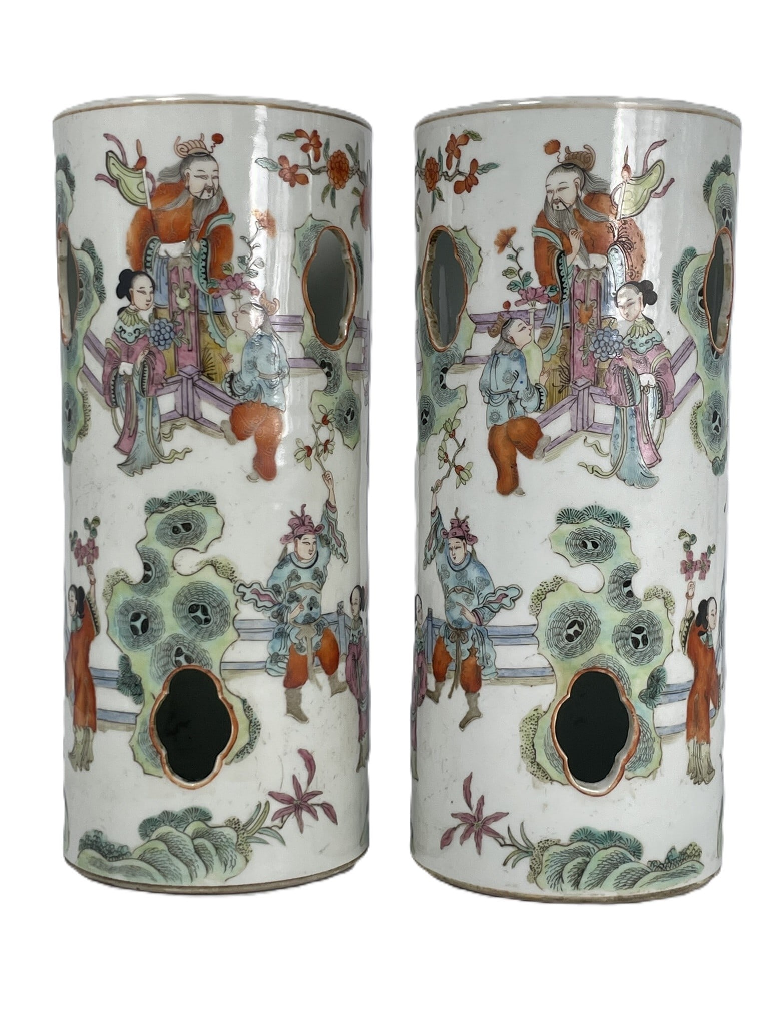 A Pair of Chinese Famille Rose 'Figural' Porcelain Hat Stand, Qing Dynasty: Tongzhi mark to each of the underside. 11.1/4 in. high, 5.7/8 in. diam. each.