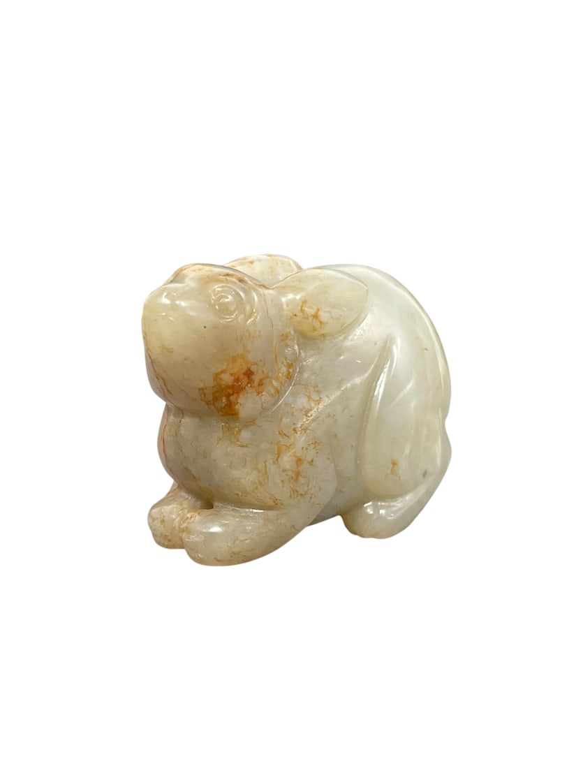 A Chinese Celadon and Russet Jade Carving of a Rabbit (1 of 9)