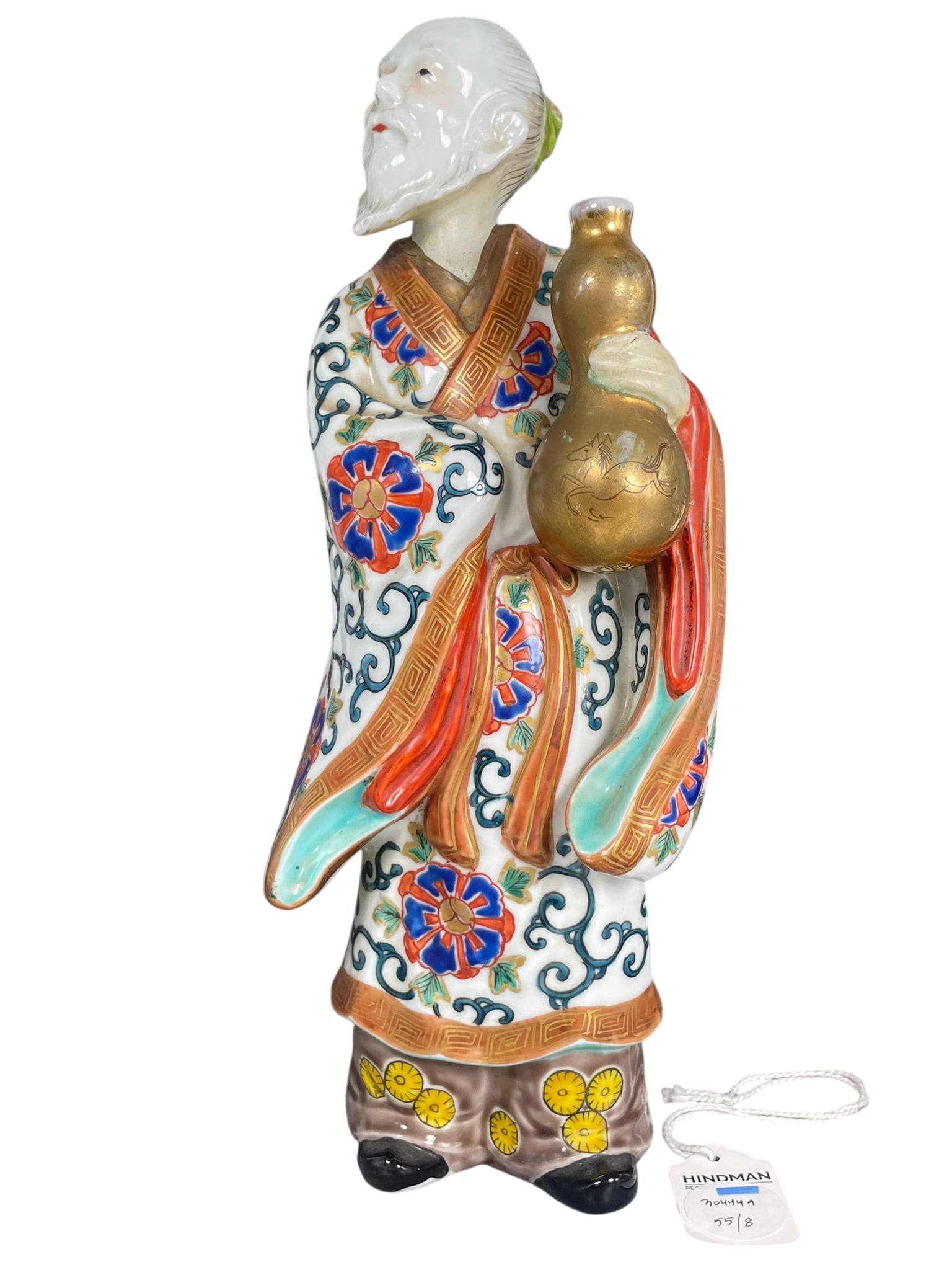 Freeman's Provenance: A Japanese Famille Rose Gilt-Decorated Figure of an Immortal, 18th Century: 11.3/4 in. high, 4.1/4 in. wide.