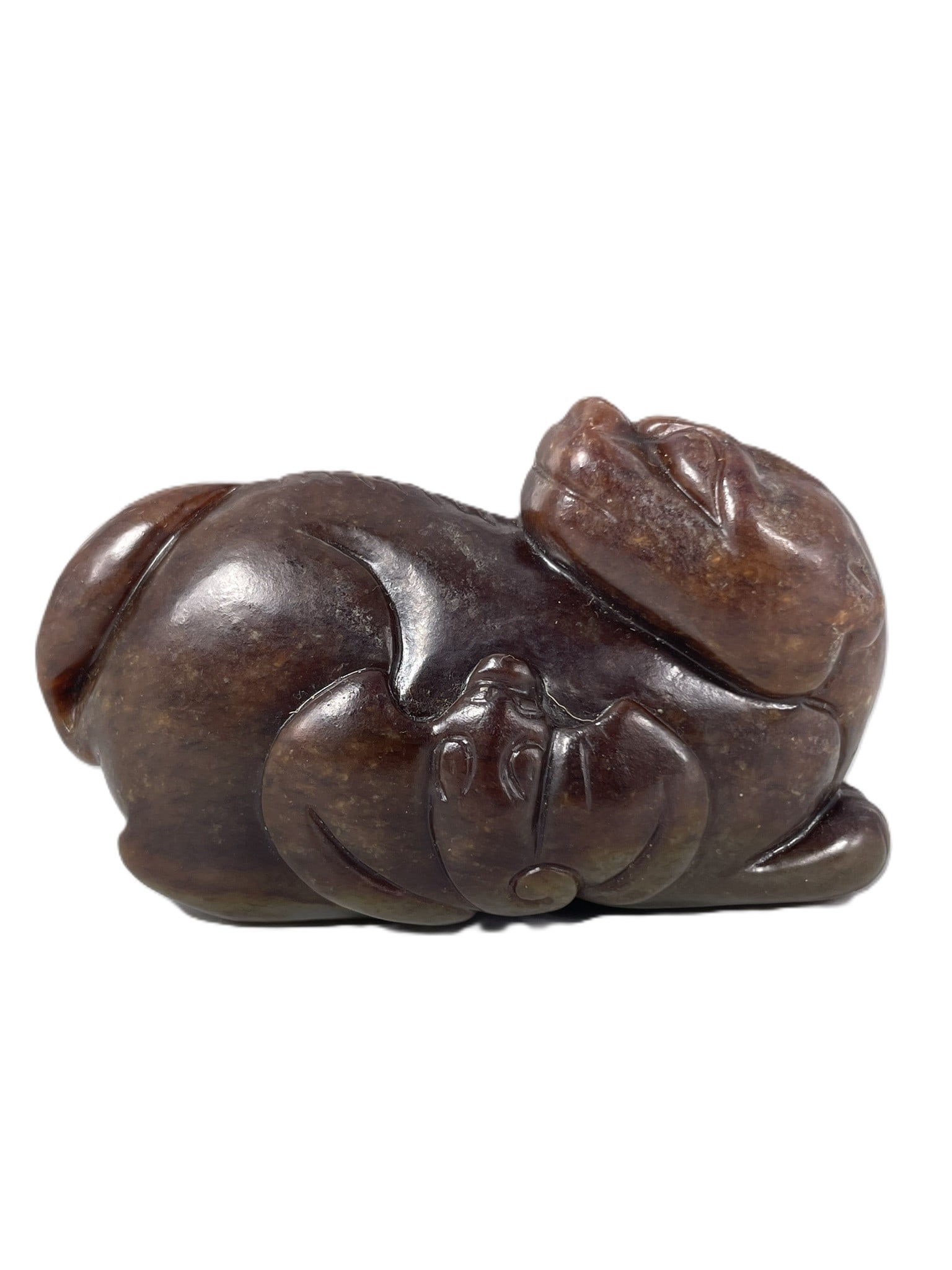 A Chinese Russet Jade Carving of Mythical Animal: 1.7/8 in. high, 3.1/4 in. wide.