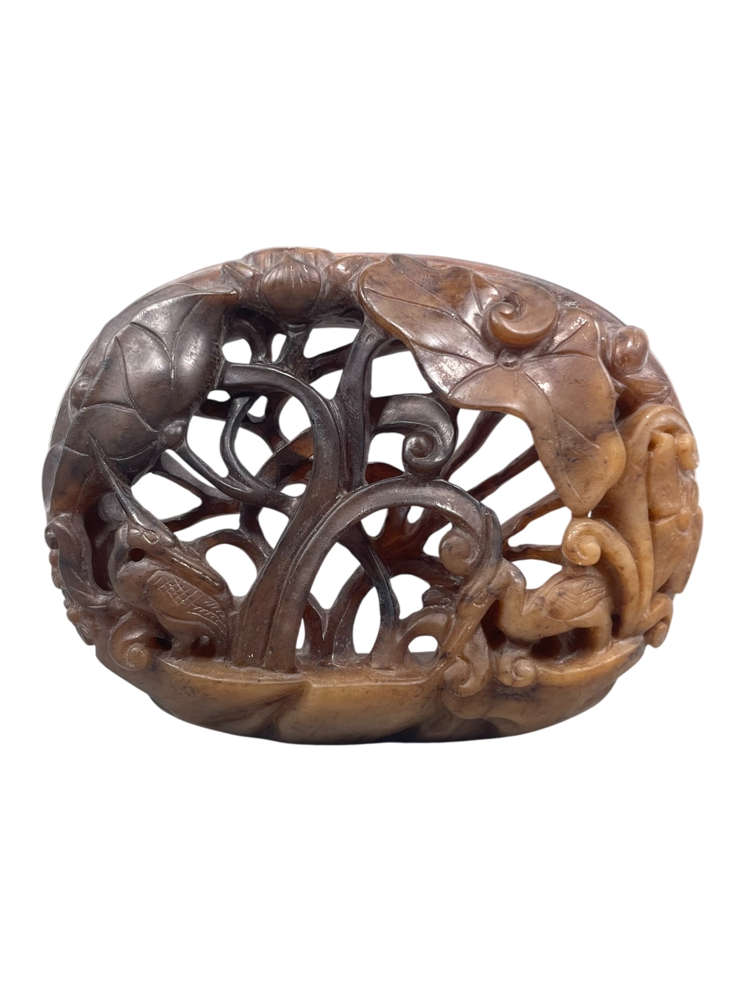 A Chinese Brown Jade Carving of Ibis and Lotus Group: 3.3/8 in. long, 2.3/4 in. wide.