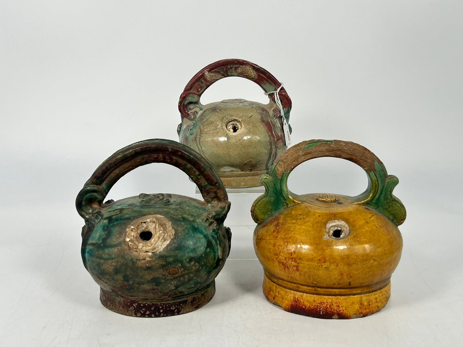 A Group of Three Antique Vietnamese Glazed Lime Pots: The largest measures 5.3/4 in. high, 5.1/4 in. wide. From antique collection of a former Yale Faculty member.