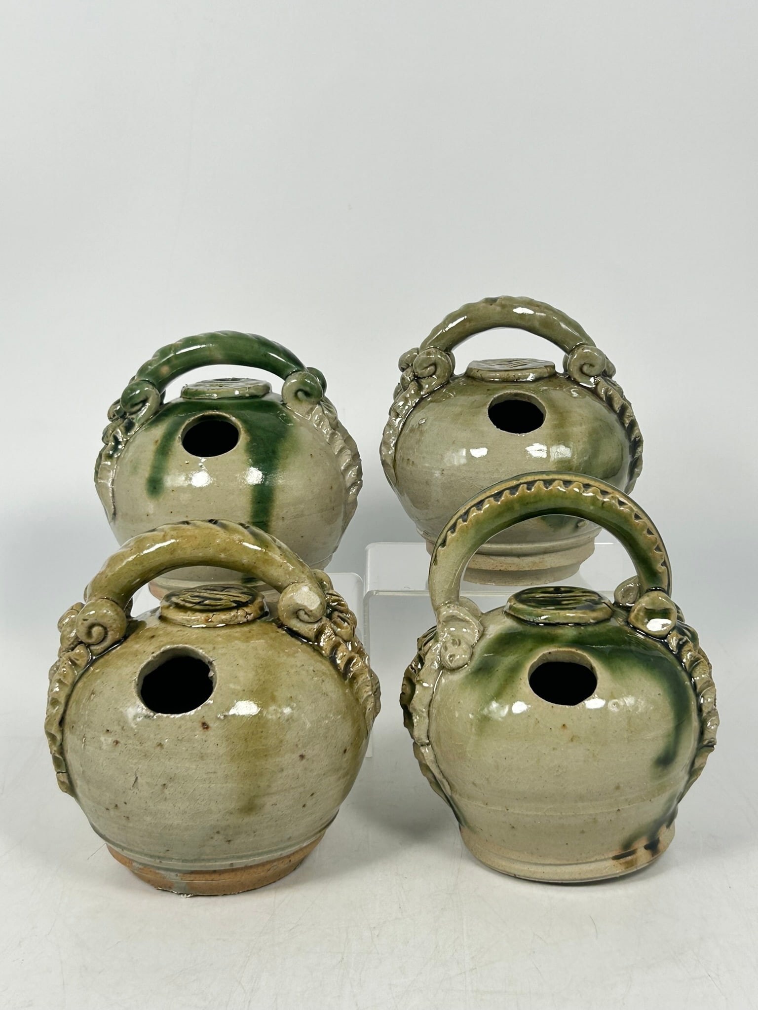 A Group of Four Vintage Vietnamese Glazed Lime Pots: The tallest measures 6 in. high, 4.1/2 in. wide. From antique collection of a former Yale Faculty member.