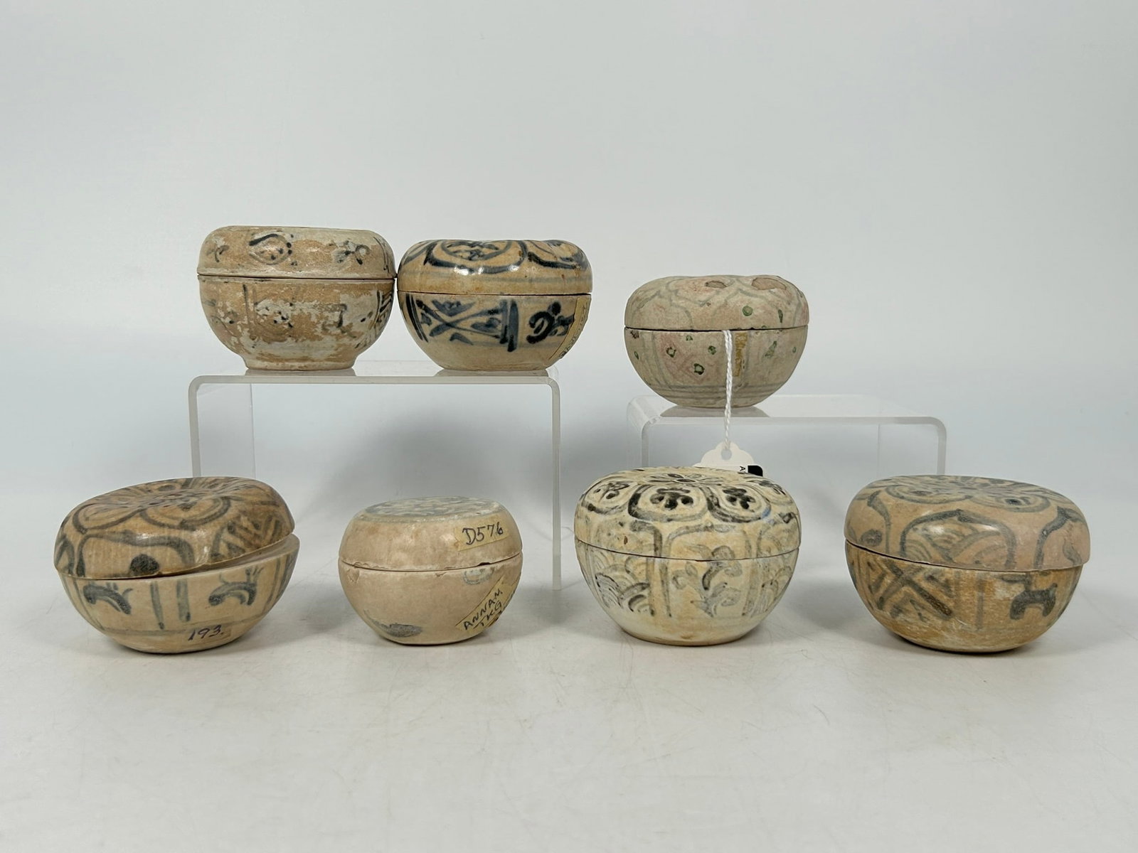 A Group of Seven Vietnamese/Annamese Blue and White Circular Boxes and Covers, Ming Dynasty: The largest measures 2 in. high, 2.3/4 in. diam. Provenance: Collection of John Allen Tabor. John Allen Tabor (1917?1991) was an American diplomat and avid collector whose passion for Asian antiques b