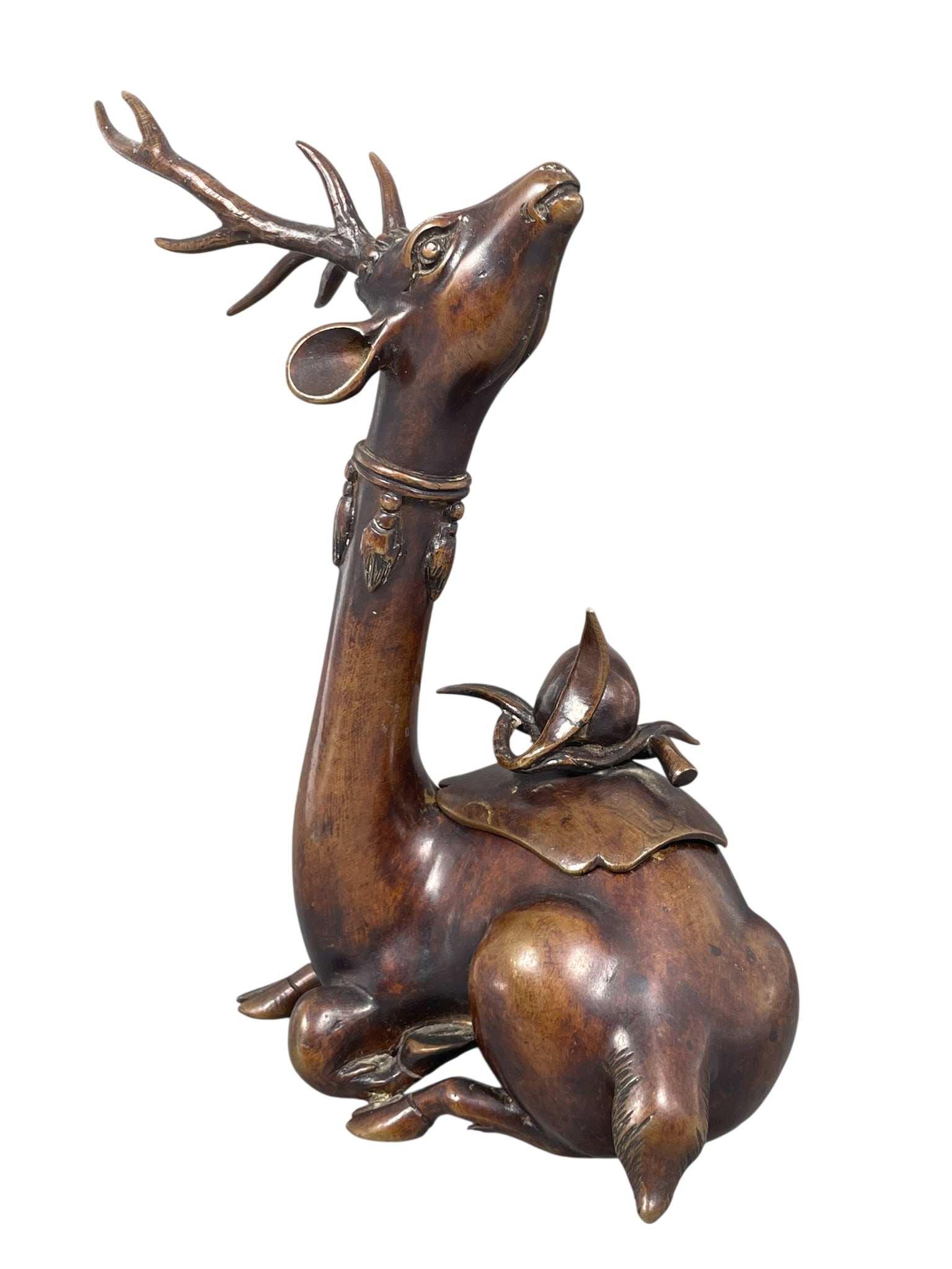 A Japanese Bronze Deer-Shaped Censer and Cover, 19th Century: 7.3/4 in. high, 5 in. wide.