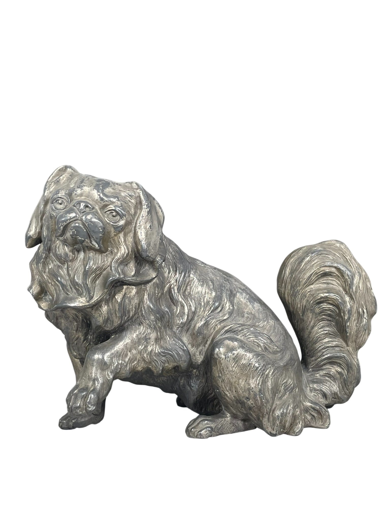 A Japanese Metal Figure of a Pekingese Dog: 8.1/2 in. high, 11.1/4 in. wide.