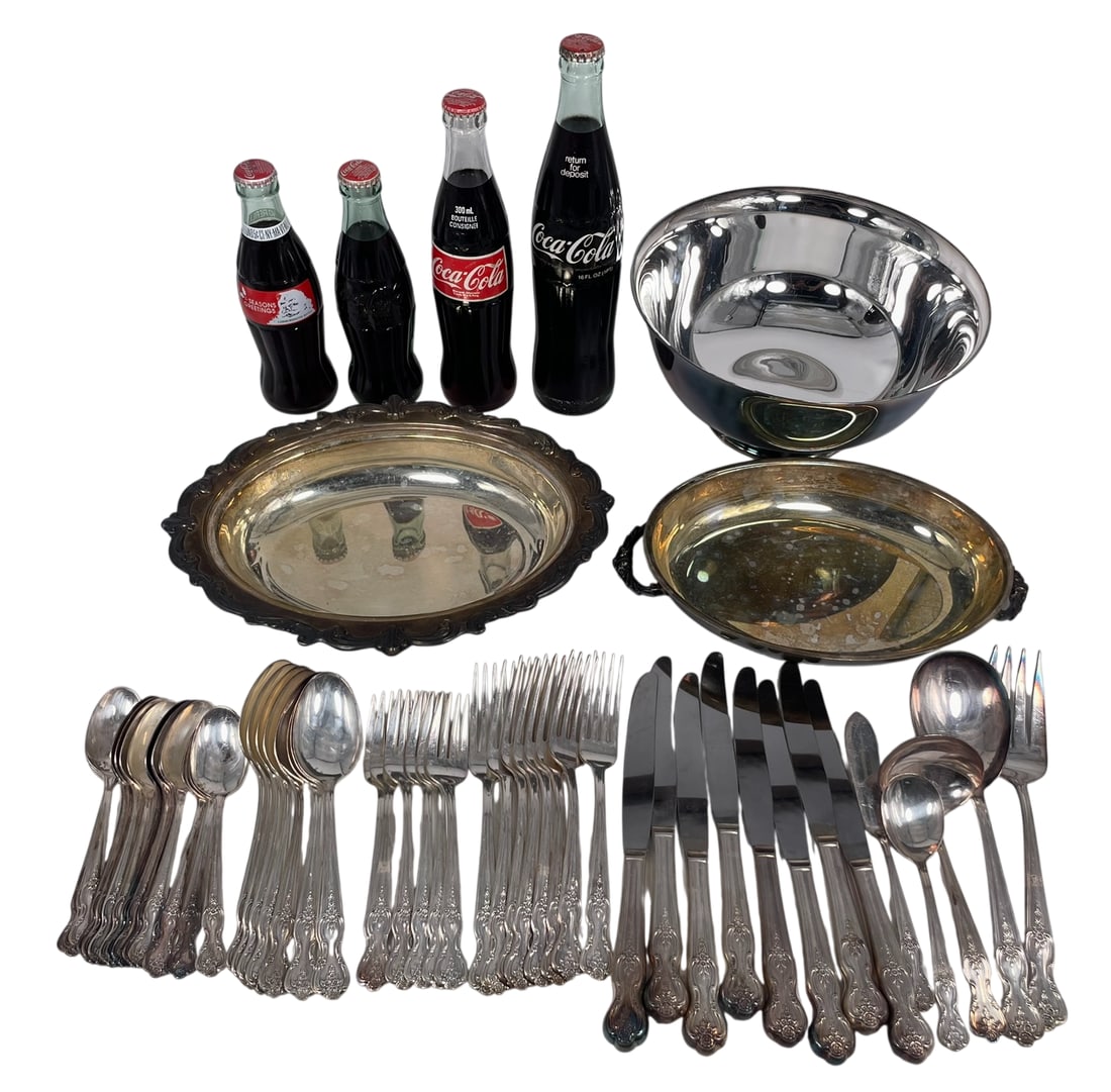 A Group of Fifty-Two Silver-Plated/Stainless Dinnerware: Together with three vintage bottles of Coca-Cola. Comprising a Reed & Barton large bowl, 4.7/8 in. high, 9.7/8 in. diam.; a Towle oval serving dish, 1.7/8 in. high, 11.7/8 in. wide; a smaller oval ser