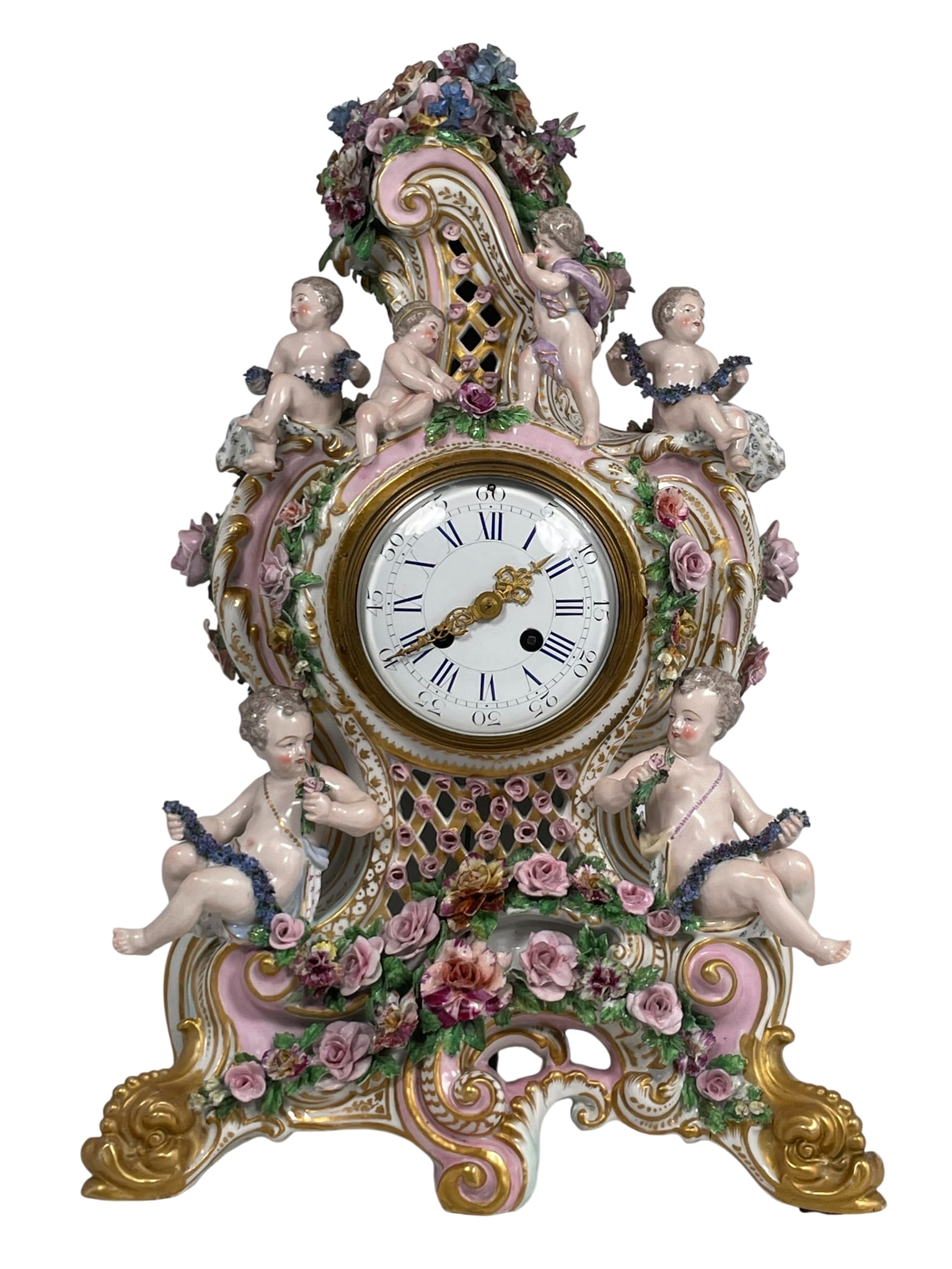 A Polychromed Porcelain Cartouche-Form Mantle Clock, a Choisy-le-Roi Mark: 20 in. high, 13 in. wide.
