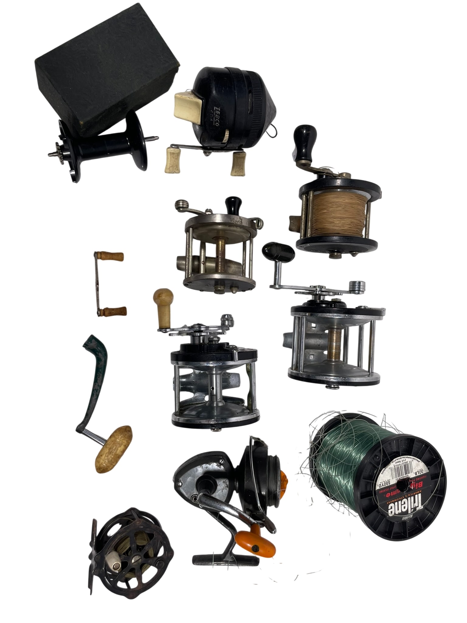 A Group of Seven Vintage Fishing Reels and Accessories: Comprising six fishing reels: Penn Long Beach no. 66, JC Higgins Sears Model #250, Pflueger Bond 2955, Zebco 204, Penn No. 80, and two unbranded fishing reels, one made in USA, and one made in Japan,
