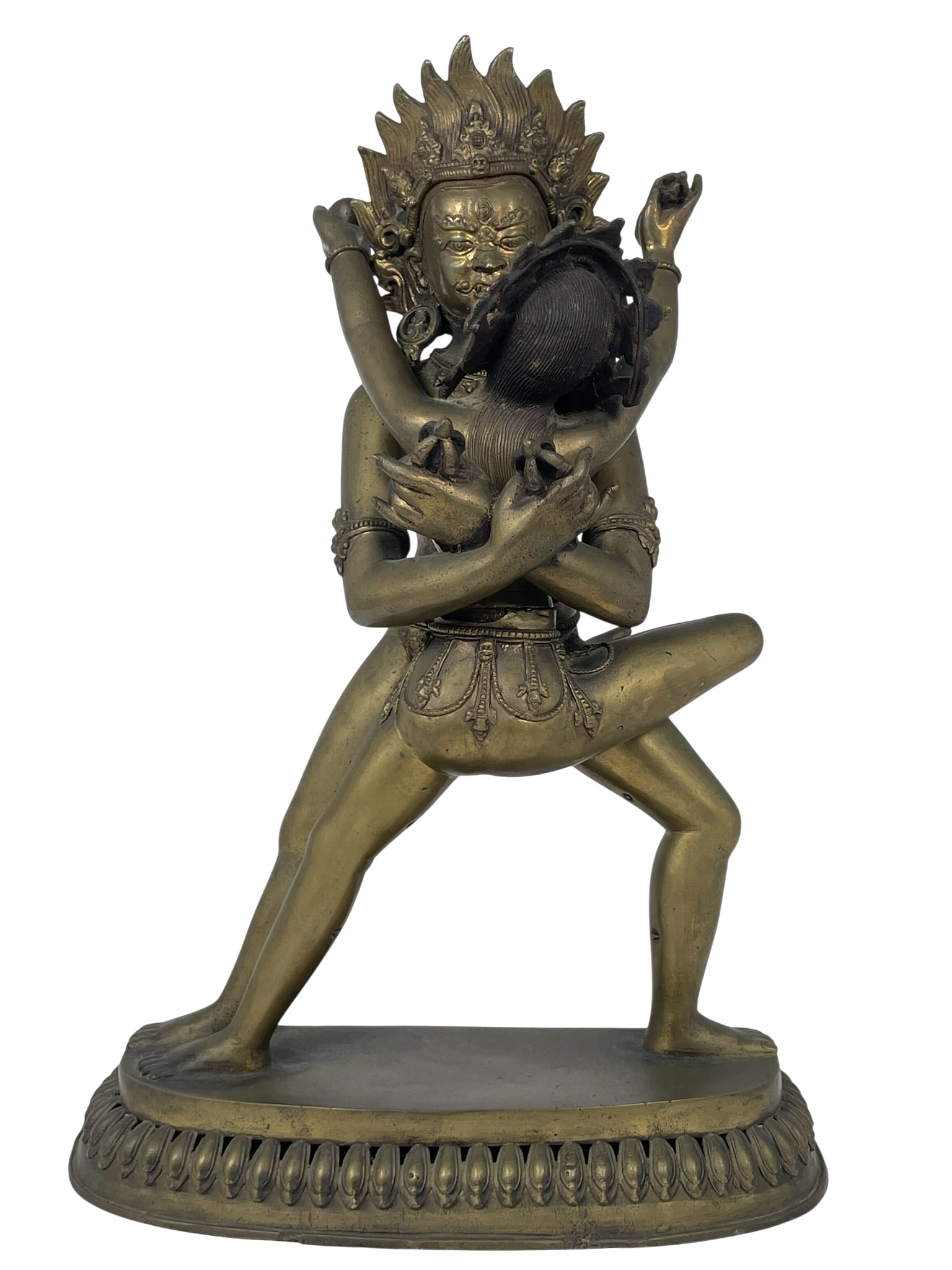 A Nepalese Bronze Figural Group of Chakrasamvara and Vajrayogini: This striking portrayal of Chakrasamvara in union with his yogini consort Vajravarahi captures the intense visualization practiced by advanced tantric masters. Central figures in the Vajrayana
