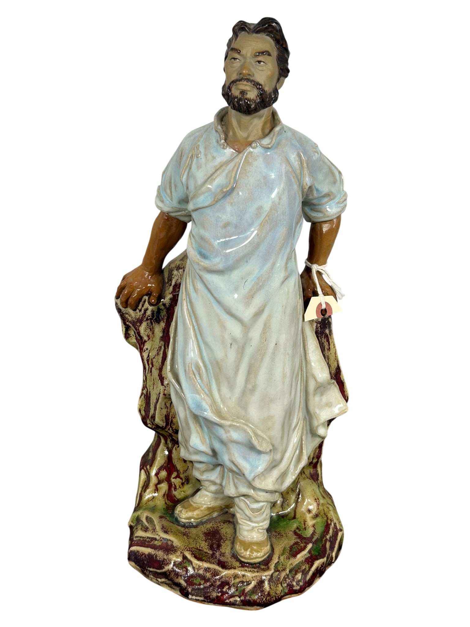 A Chinese Shiwan Pottery Figure: 14.1/2 in. high, 7 in. wide.