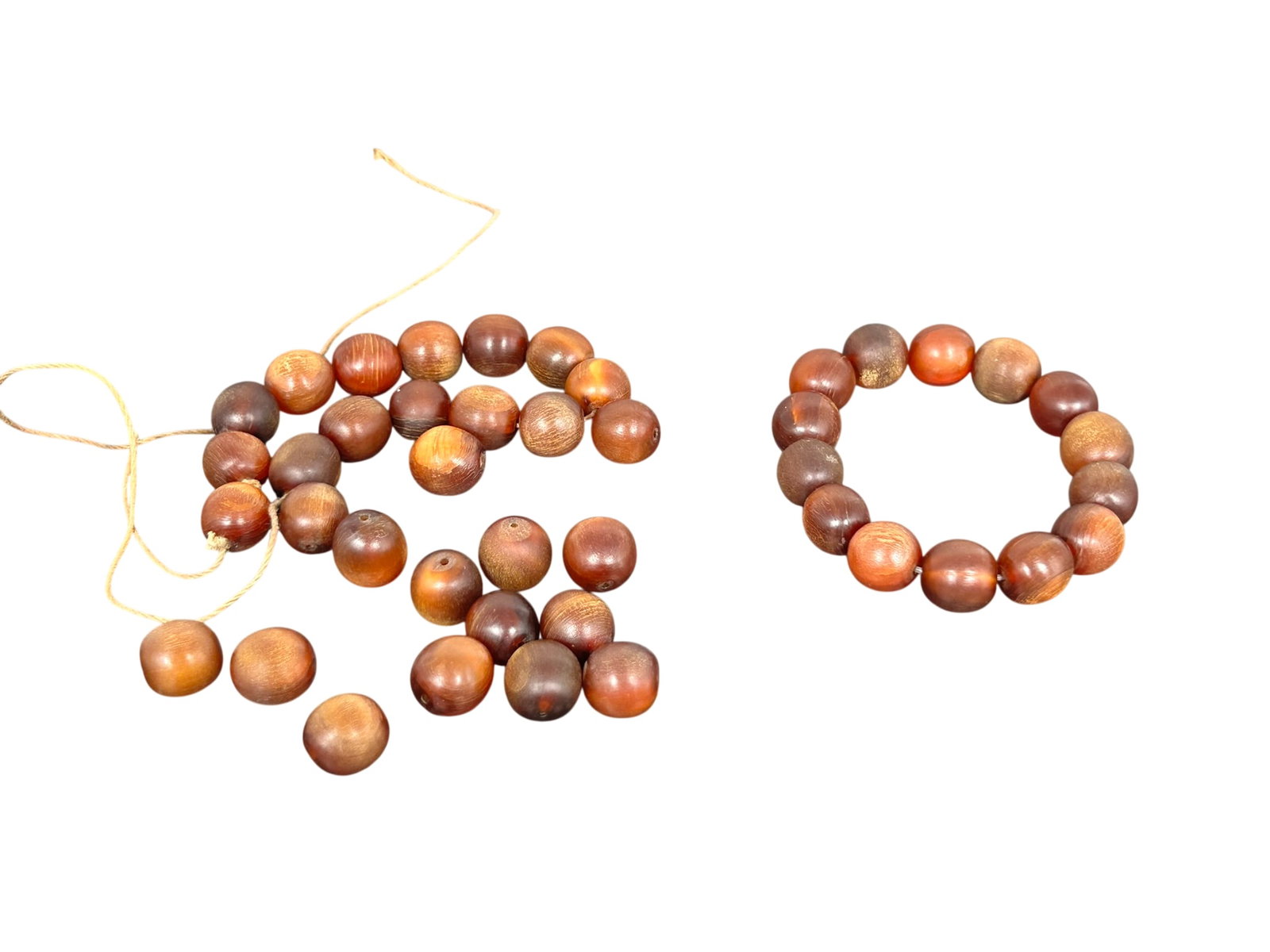 A Group of Horn Beads: 1/2 in. diam. each.
