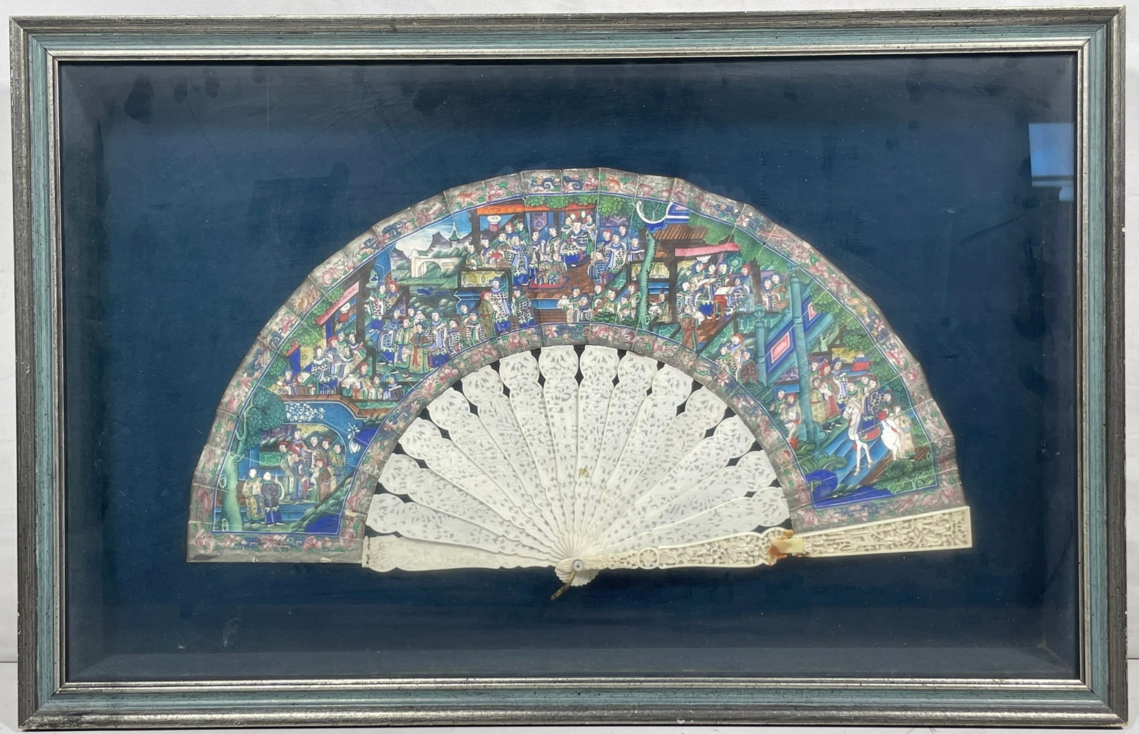 A Chinese Fan Leaf: The fan leaf measures 19.1/4 in. wide, 10 in. high; the shadow box measures 25.1/4 in. wide, 14.1/2 in. wide, 2.3/4 in. deep.