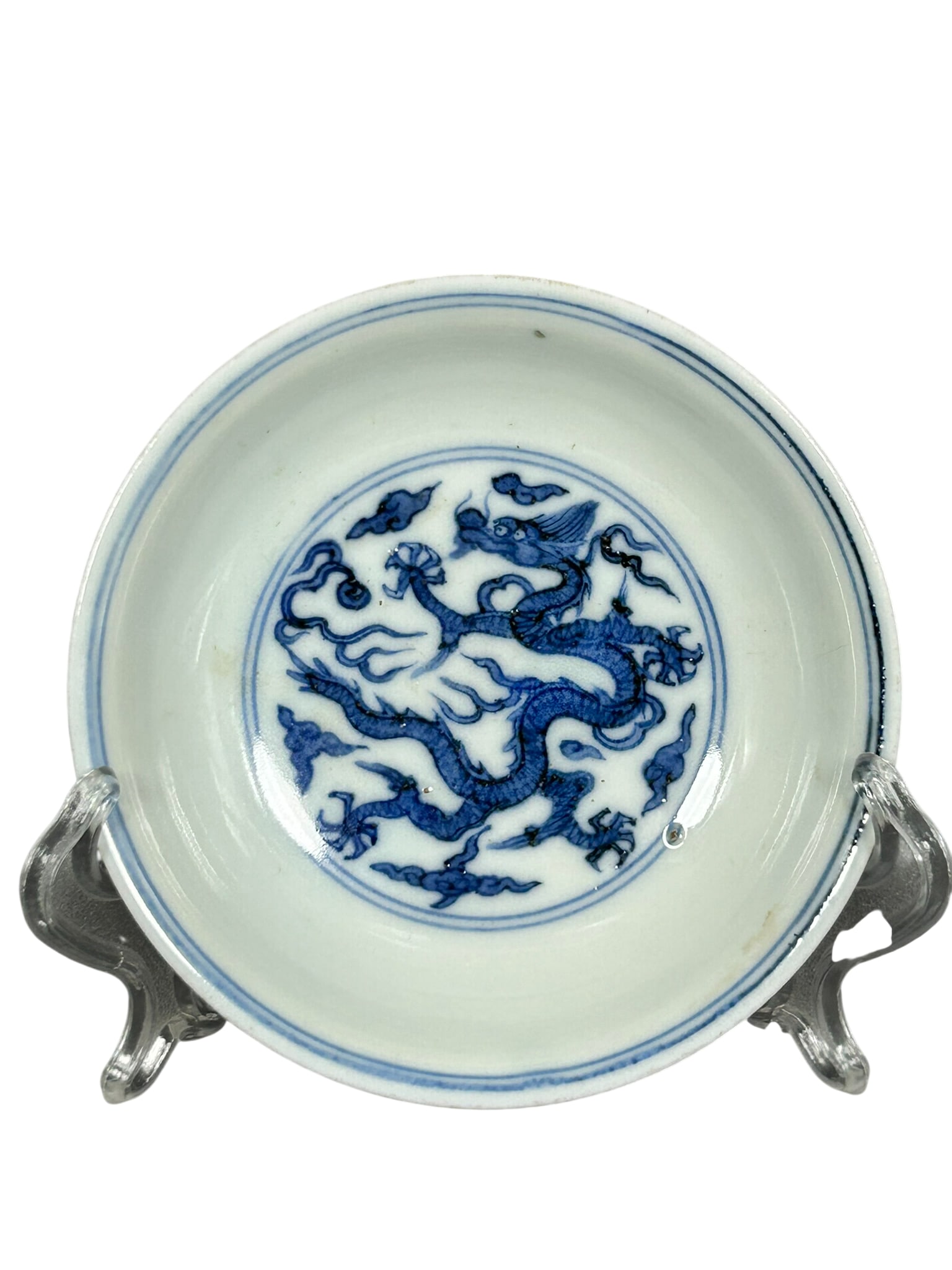 A Chinese Small Blue and White 'Dragon' Dish, Wanli Mark and of the Period, Ming Dynasty: 4.1/8 in. diam.