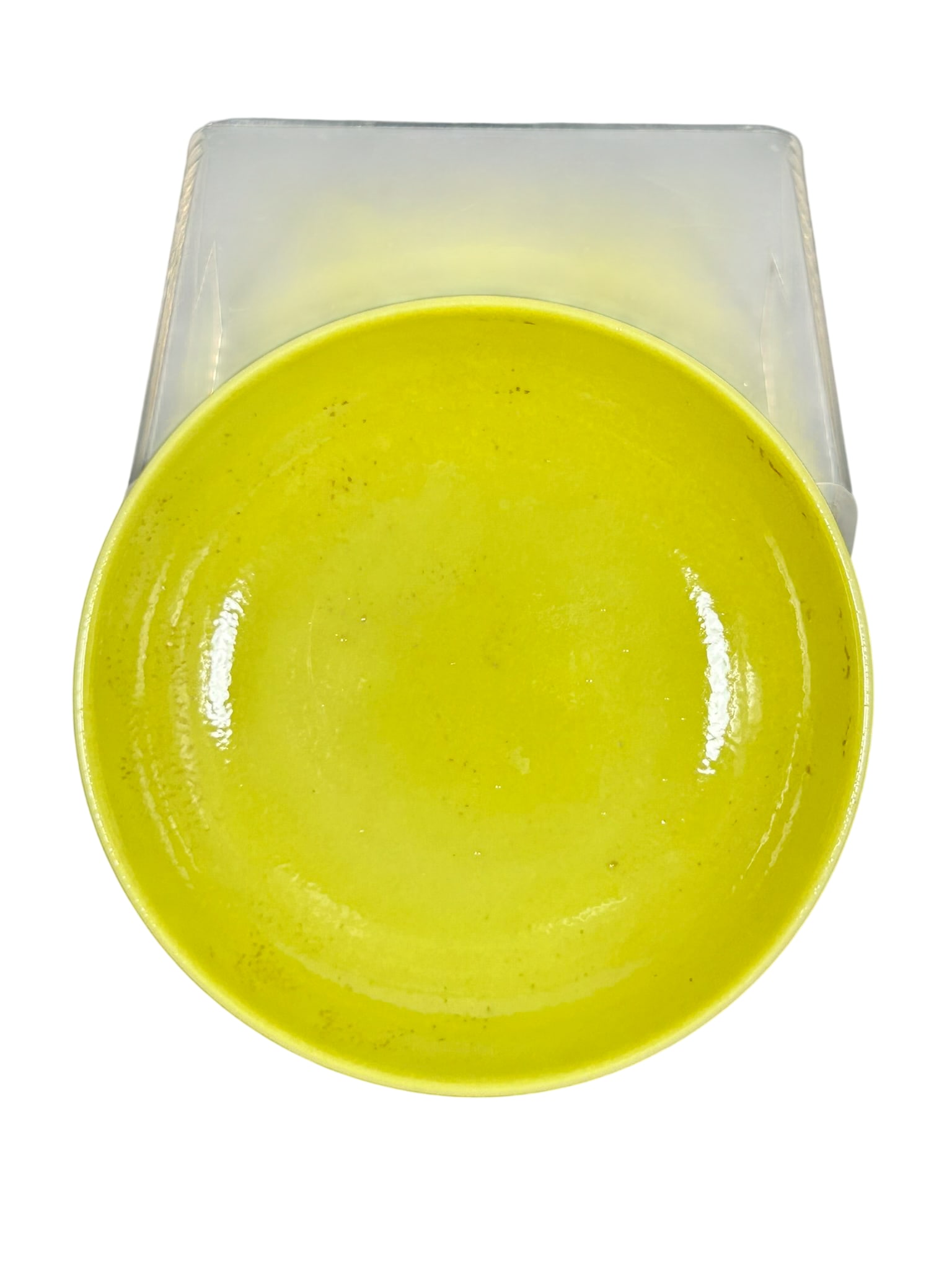 A Chinese Yellow-Glazed Dish, Yongzheng Mark and of the Period, Qing Dynasty: 3.1/2 in. diam.
