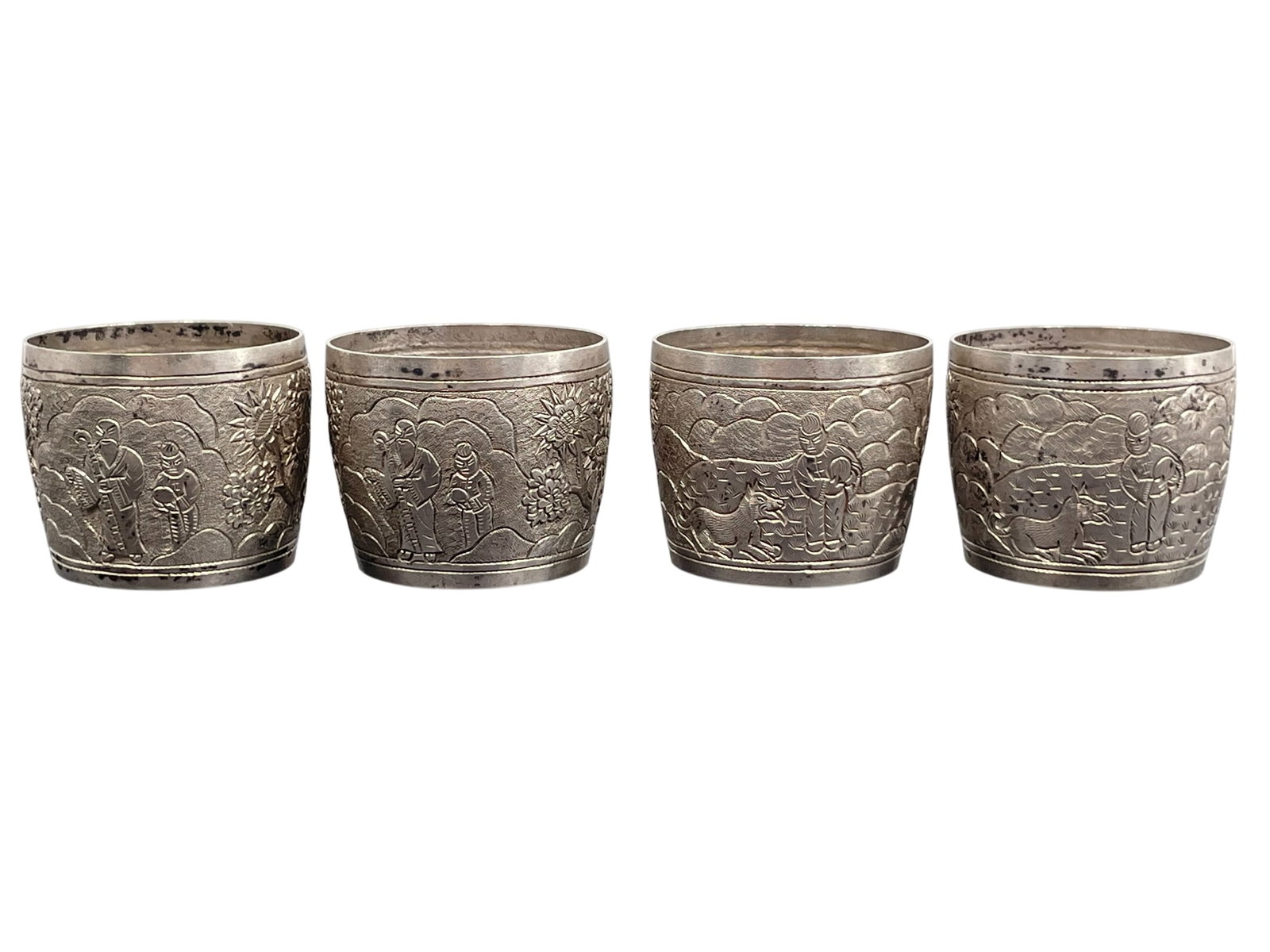 A Set of Four Chinese Silver Cups: With studio mark 'Chang Yuan' to each of the bottoms. 1.3/4 in. high, 2 in. diam. each.