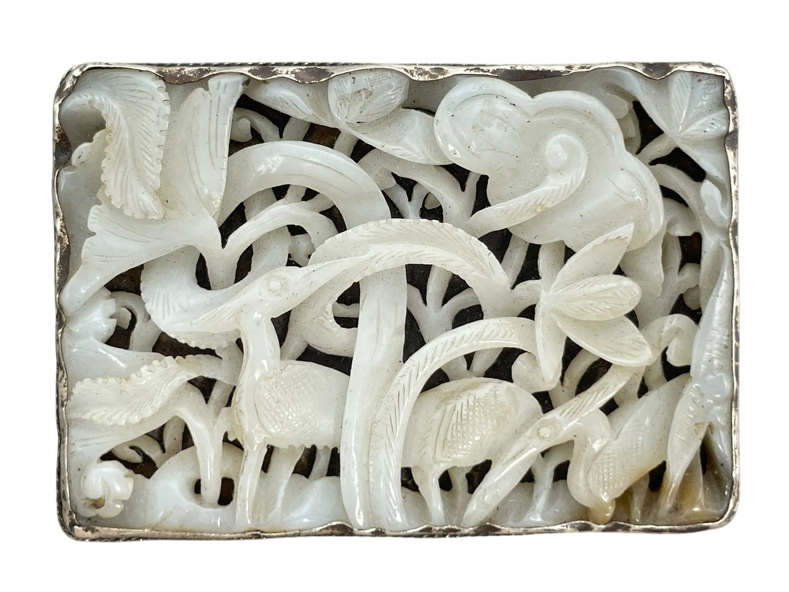 A Chinese Carved Reticulated White Jade and Silver Belt Buckle (1 of 9)
