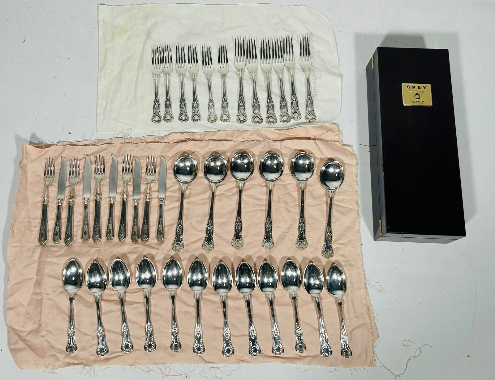 A Set of Silver Plated Flatware: With a SPEY wood box.