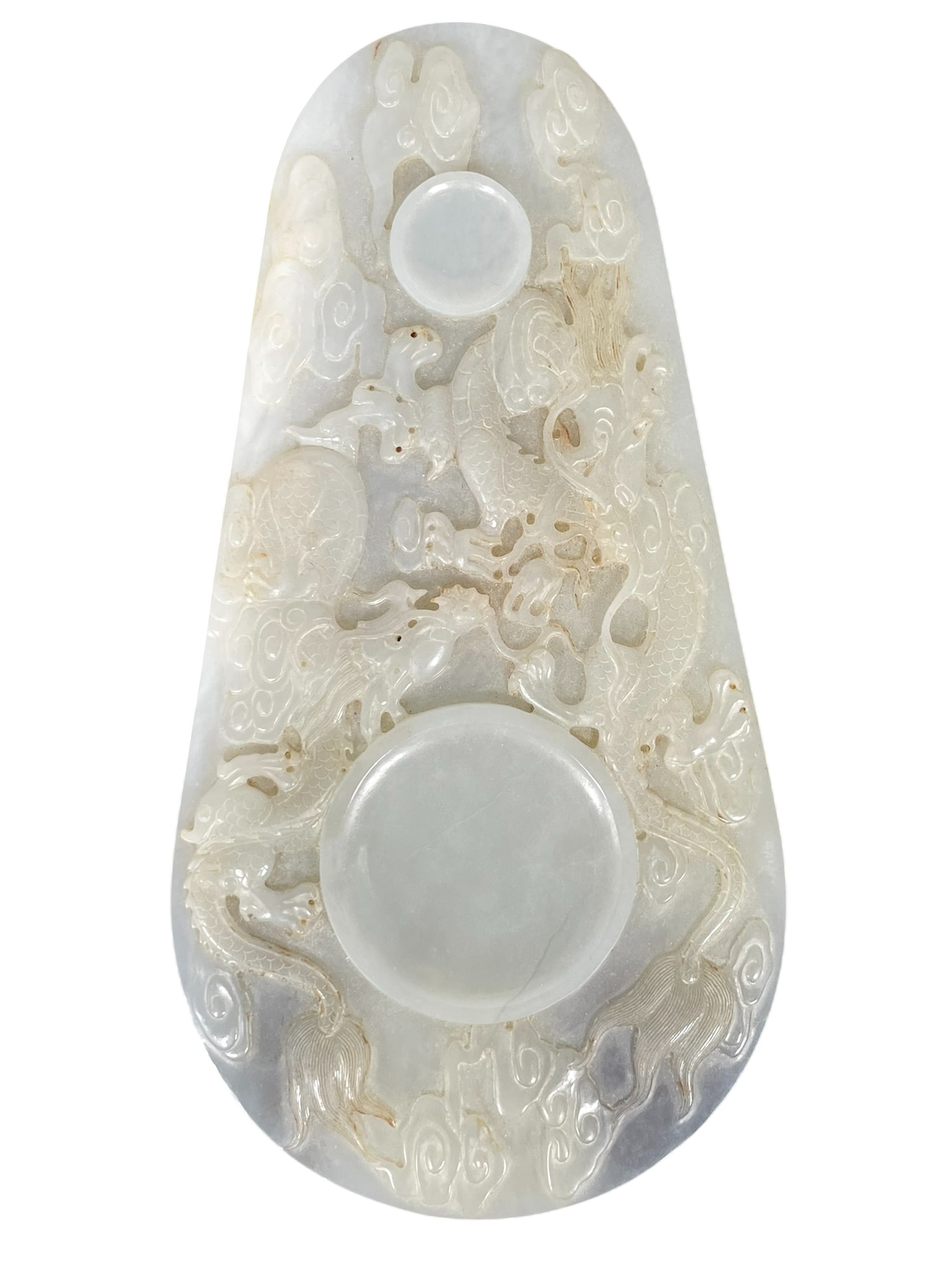 A Chinese Carved White Jade Inkwell: An apocryphal Guangxu mark to the reverse side. 9 in. long, 4.3/4 in. wide.